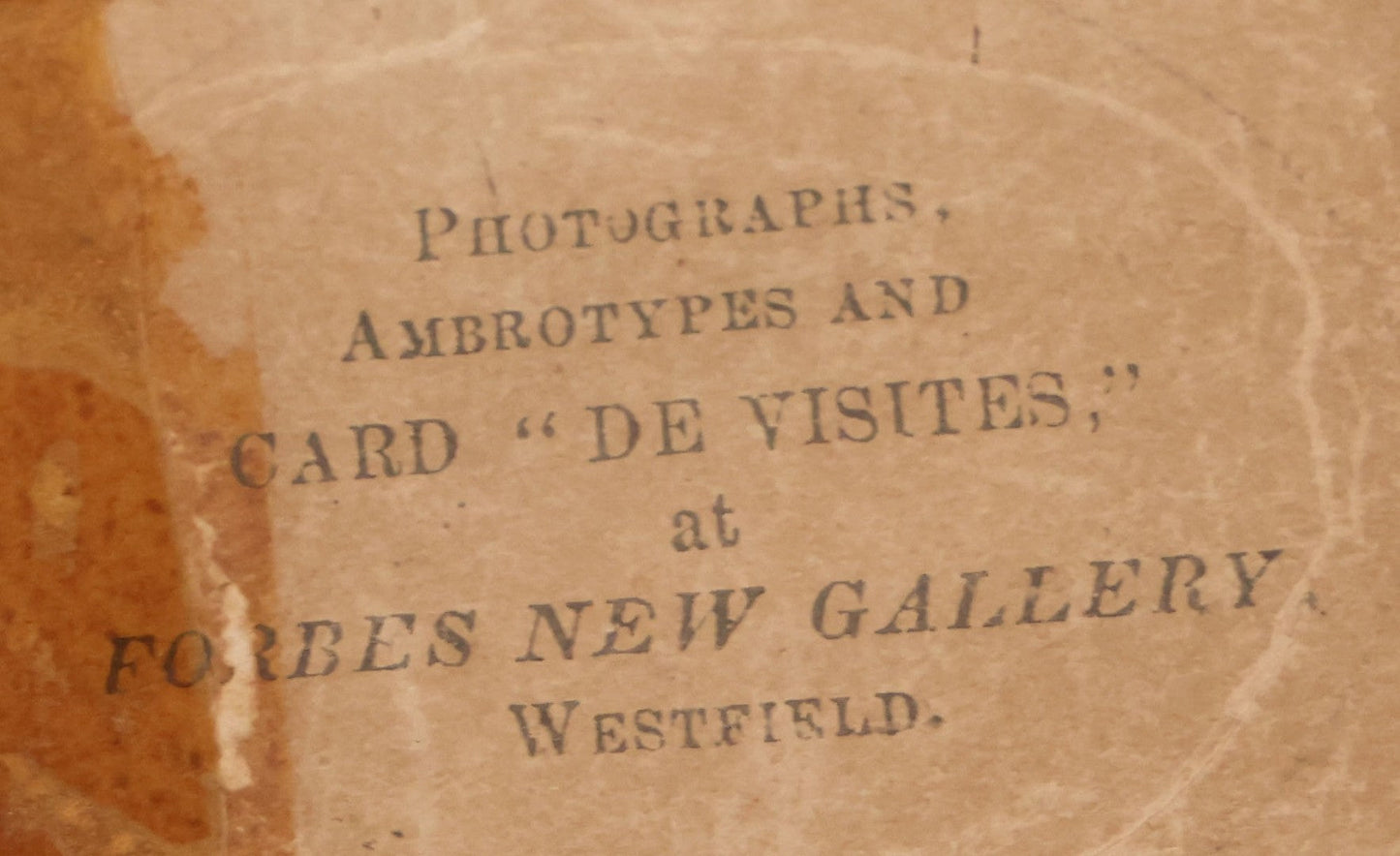 Lot 070 - Antique 1/6th Plate Ruby Ambrotype Photograph Of Smiling Little Girl With Red Tinted Cheeks, Curly Hair, Holding Books, Photograph Taken At Forbes New Gallery, Westfield, Massachusetts, In Half Leatherette Case