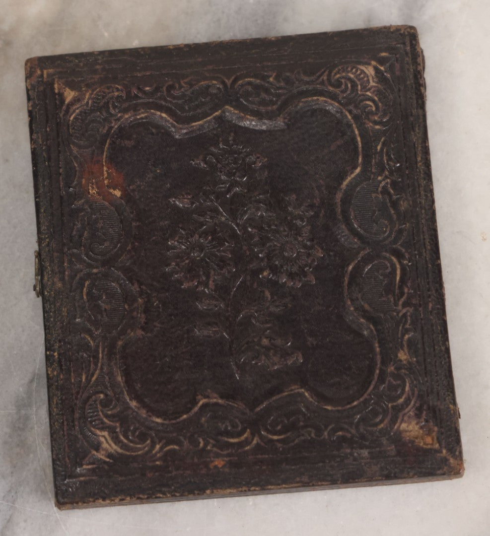 Lot 070 - Antique 1/6th Plate Ruby Ambrotype Photograph Of Smiling Little Girl With Red Tinted Cheeks, Curly Hair, Holding Books, Photograph Taken At Forbes New Gallery, Westfield, Massachusetts, In Half Leatherette Case