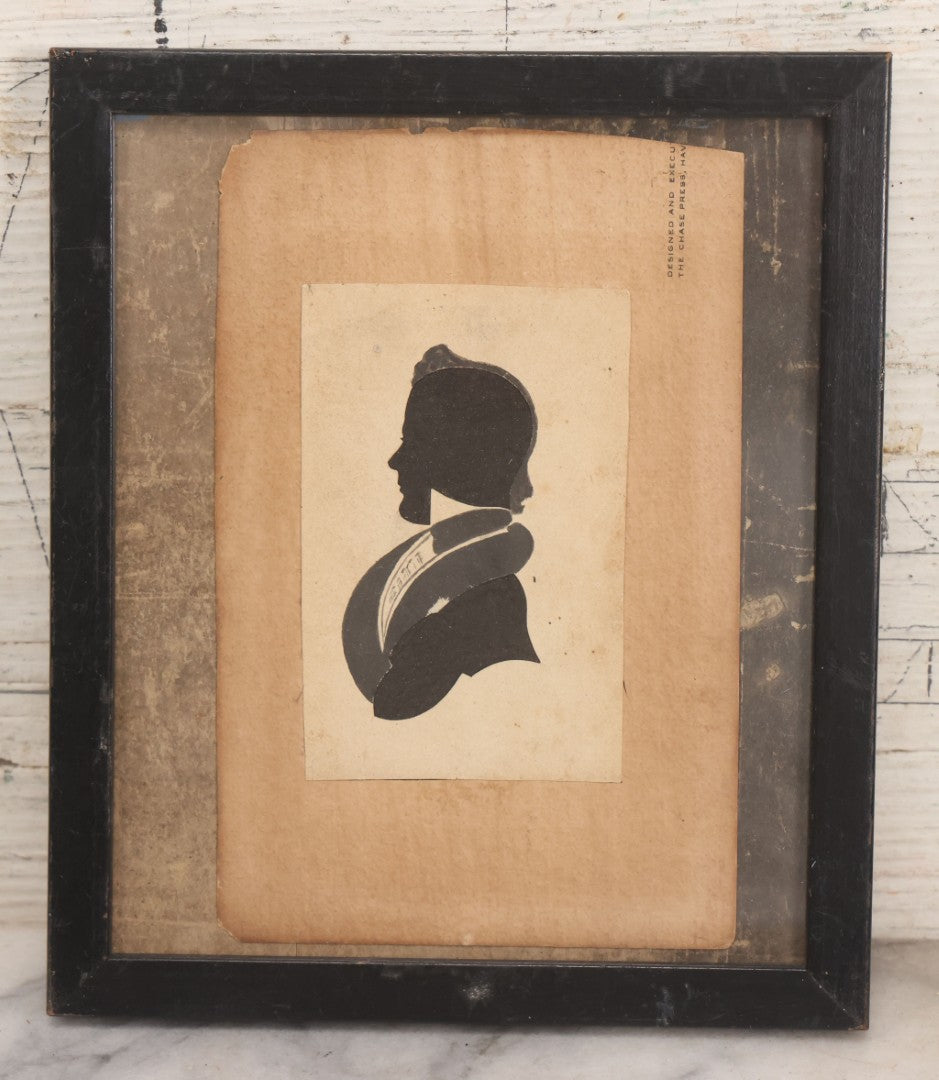 Lot 074 - Antique Hand Cut Velvet Backed Silhouette Of A Man With Pen And Ink Finishing, Mounted To Paper As Found, In Frame, 6-5/8" x 7-3/4"