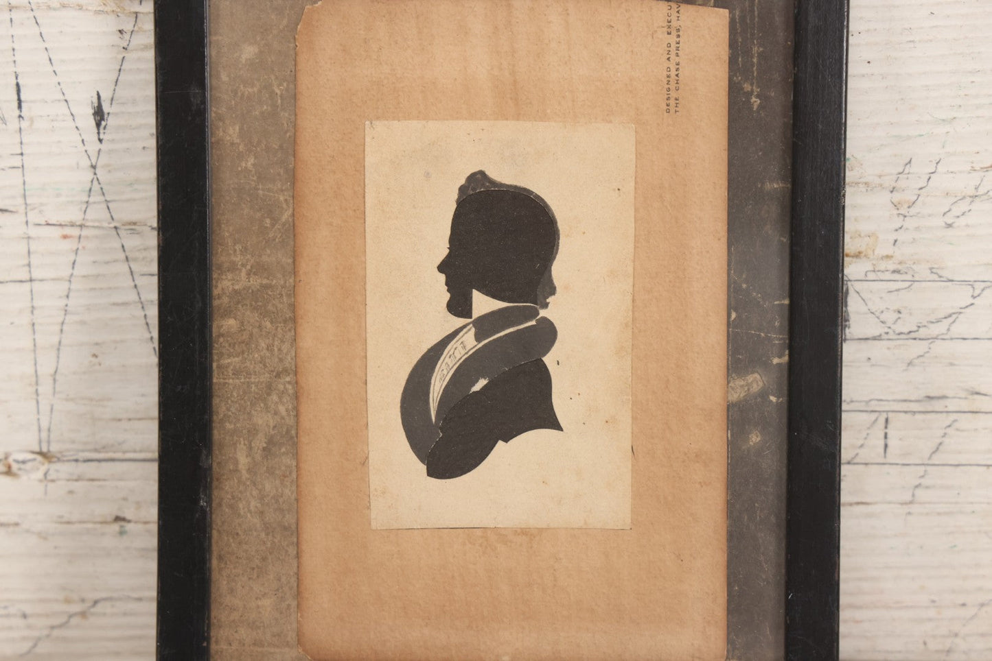 Lot 074 - Antique Hand Cut Velvet Backed Silhouette Of A Man With Pen And Ink Finishing, Mounted To Paper As Found, In Frame, 6-5/8" x 7-3/4"