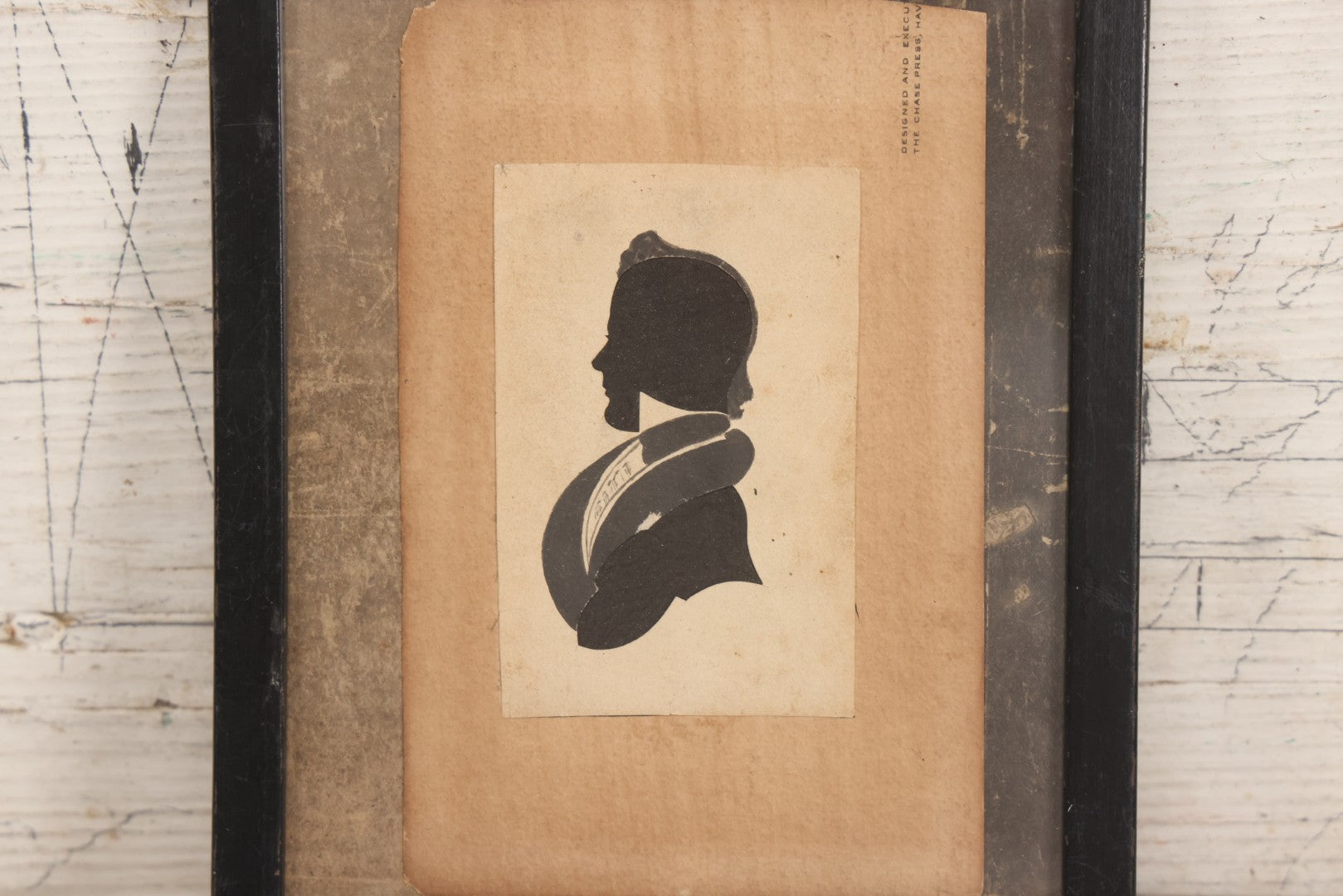 Lot 074 - Antique Hand Cut Velvet Backed Silhouette Of A Man With Pen And Ink Finishing, Mounted To Paper As Found, In Frame, 6-5/8" x 7-3/4"