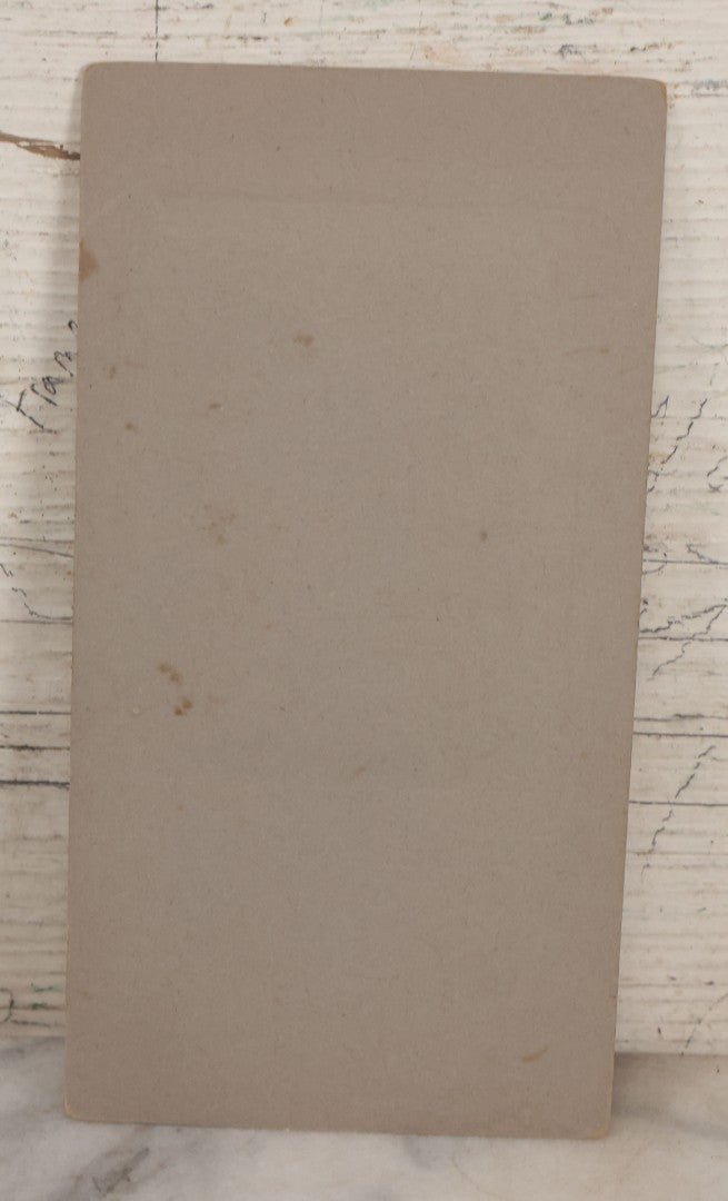 Lot 076 - Antique Boarded Photograph Of Young Child In Striped Shirt And Hat Standing With An American Flag In The Grass