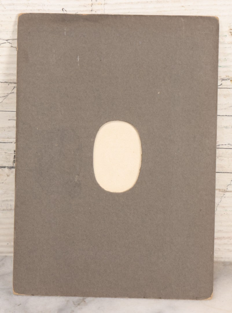 Lot 078 - Antique Snapshot Photograph In Paper Board Frame Of Little Girl Named Gladis With Blond Hair Sitting In Grass With Cat Named Toby, Identified On Verso