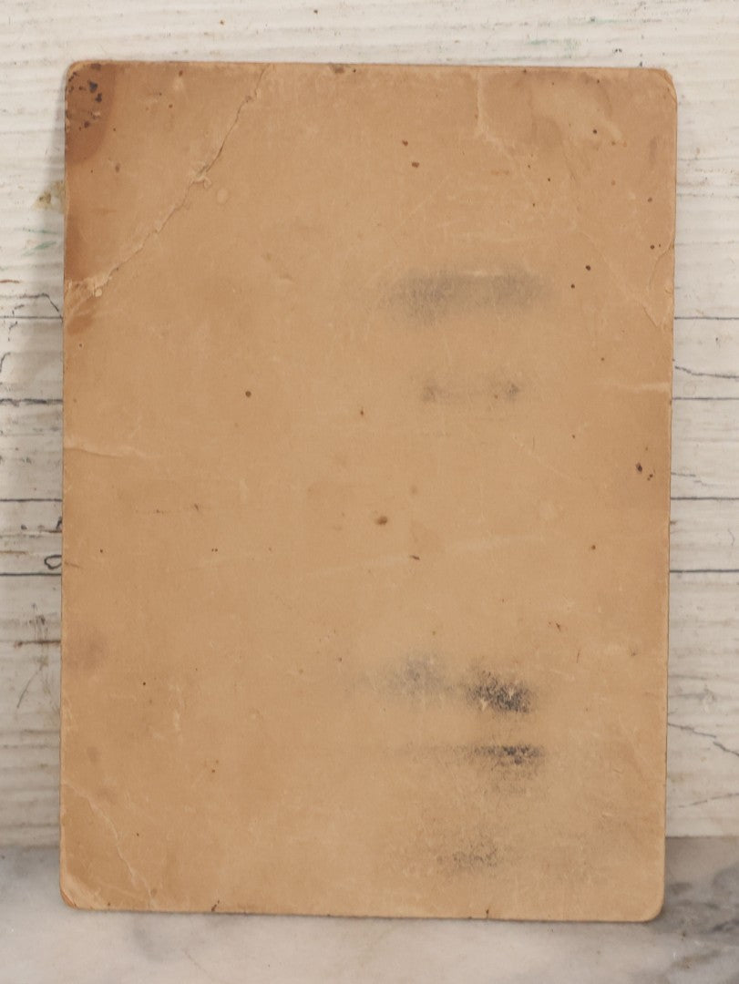 Lot 083 - Antique Boarded Occupational Photograph Of Two Bartenders Standing Behind Bar Posing With Bottles Of Elks Club Whiskey, Other Advertisements Visible Including For Boston Cadet Cigars, Note Damaged Upper Right Corner