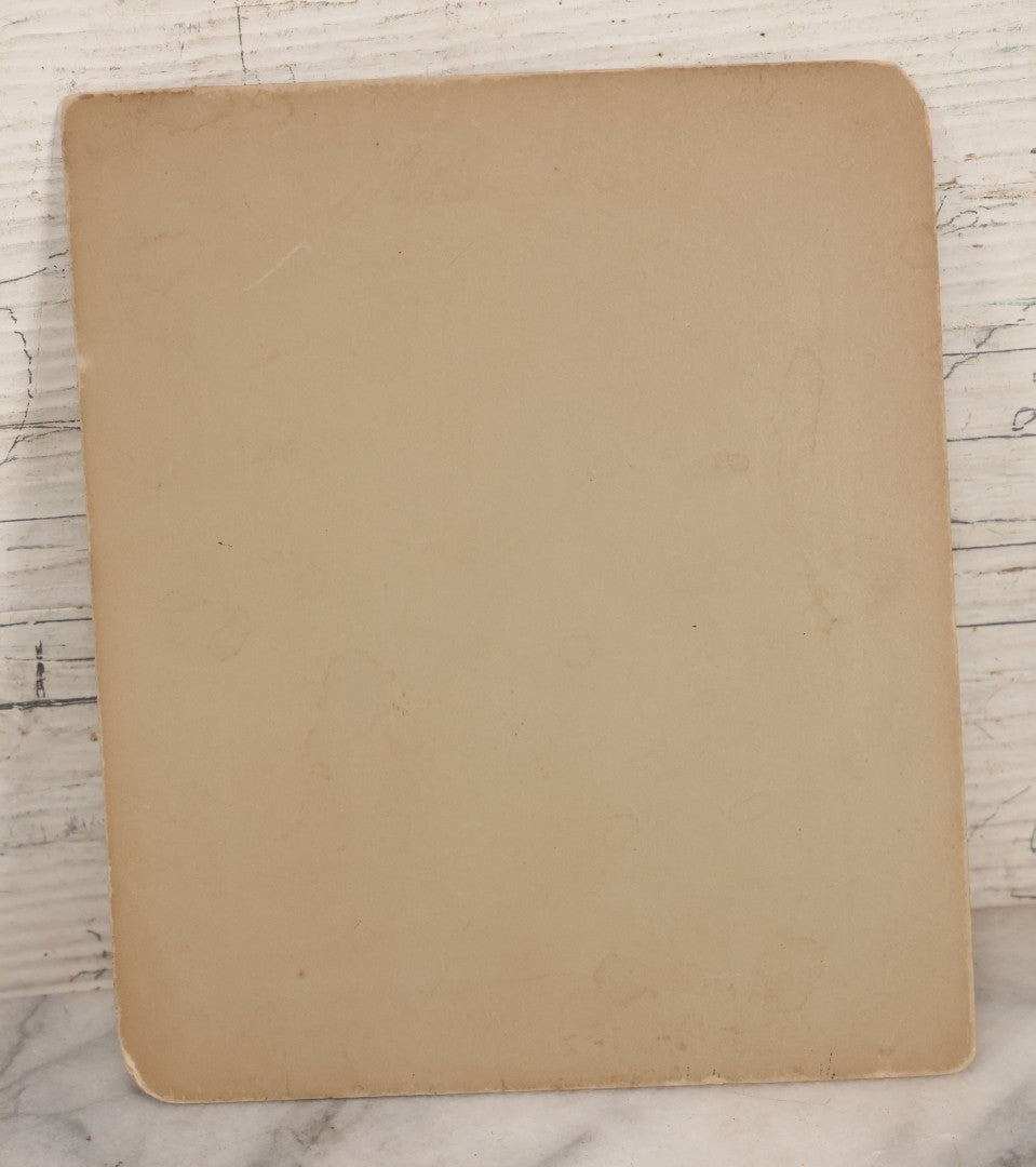 Lot 086 - Antique Boarded Interior Photograph Of Woman Dressed In Suit And Top Hat Smoking Cigar, With Handwritten Caption "Take A Little Bit Off The Top For Me" With Little Dog Figurine