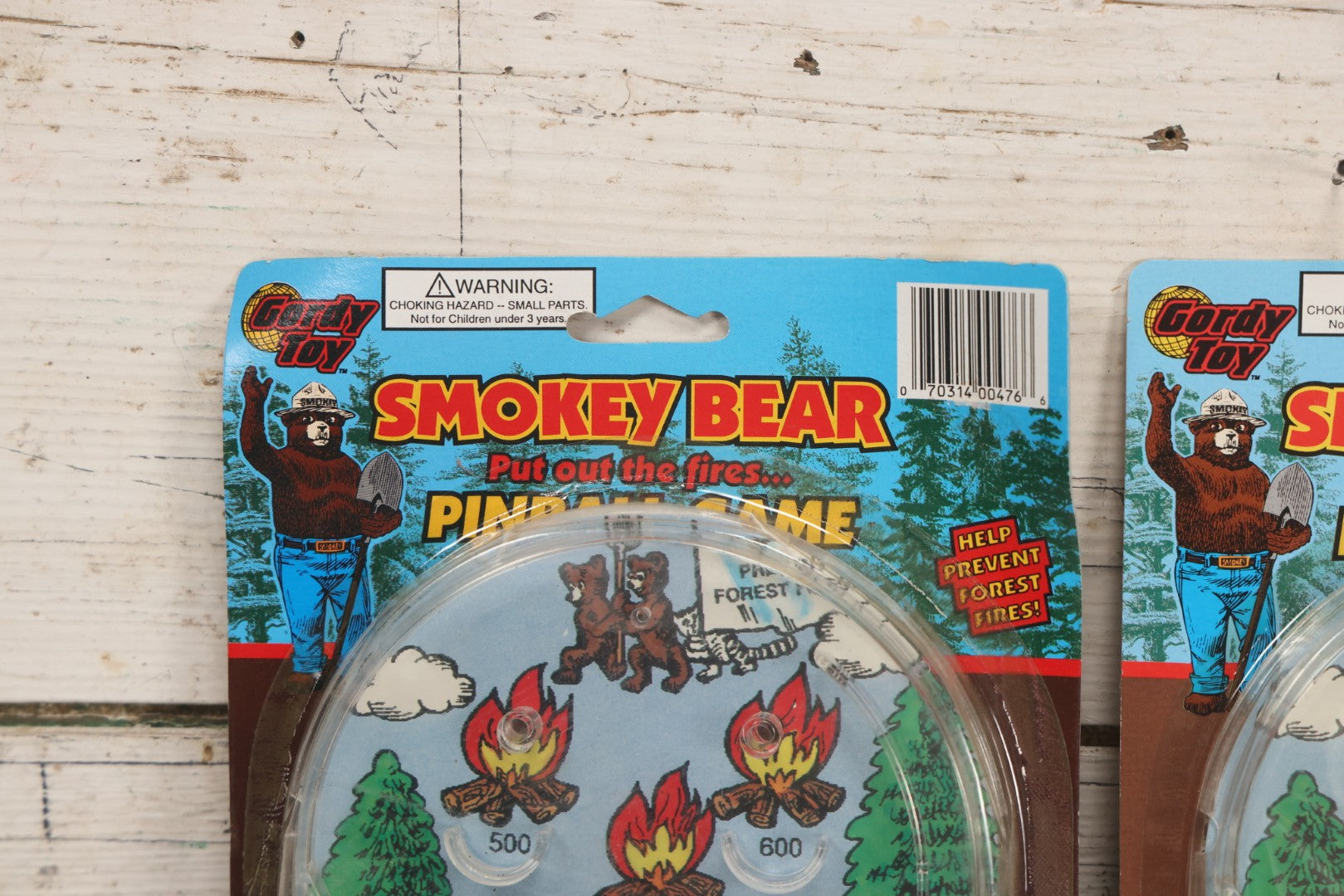 Lot 089 - Grouping Of Eight New Old Stock N.O.S. Smokey Bear "Put Out The Fires..." Pinball Game, Manufactured By Gordy International, Inc., Plainfield, New Jersey, No. 476, Made In China