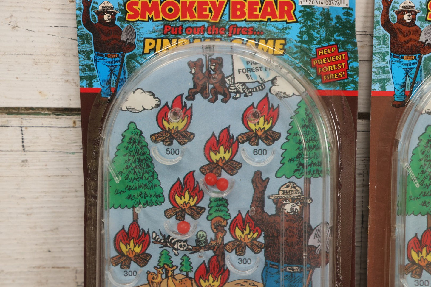 Lot 089 - Grouping Of Eight New Old Stock N.O.S. Smokey Bear "Put Out The Fires..." Pinball Game, Manufactured By Gordy International, Inc., Plainfield, New Jersey, No. 476, Made In China