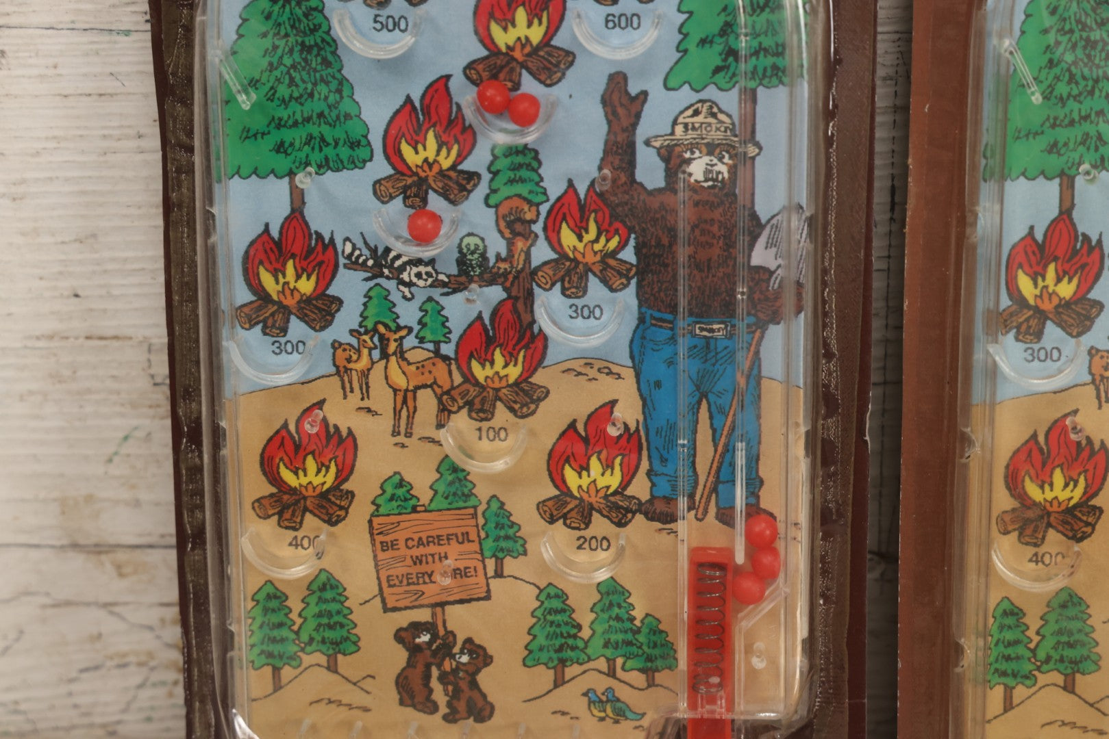 Lot 089 - Grouping Of Eight New Old Stock N.O.S. Smokey Bear "Put Out The Fires..." Pinball Game, Manufactured By Gordy International, Inc., Plainfield, New Jersey, No. 476, Made In China