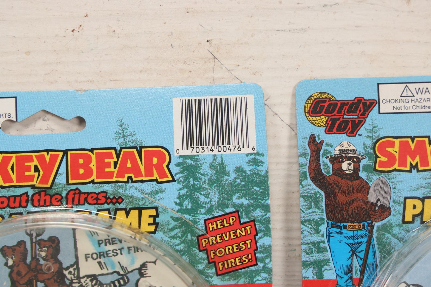 Lot 089 - Grouping Of Eight New Old Stock N.O.S. Smokey Bear "Put Out The Fires..." Pinball Game, Manufactured By Gordy International, Inc., Plainfield, New Jersey, No. 476, Made In China