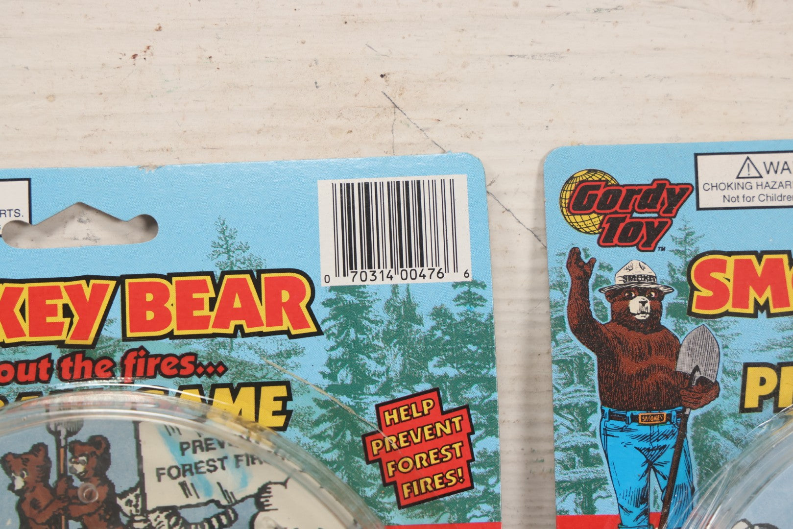 Lot 089 - Grouping Of Eight New Old Stock N.O.S. Smokey Bear "Put Out The Fires..." Pinball Game, Manufactured By Gordy International, Inc., Plainfield, New Jersey, No. 476, Made In China