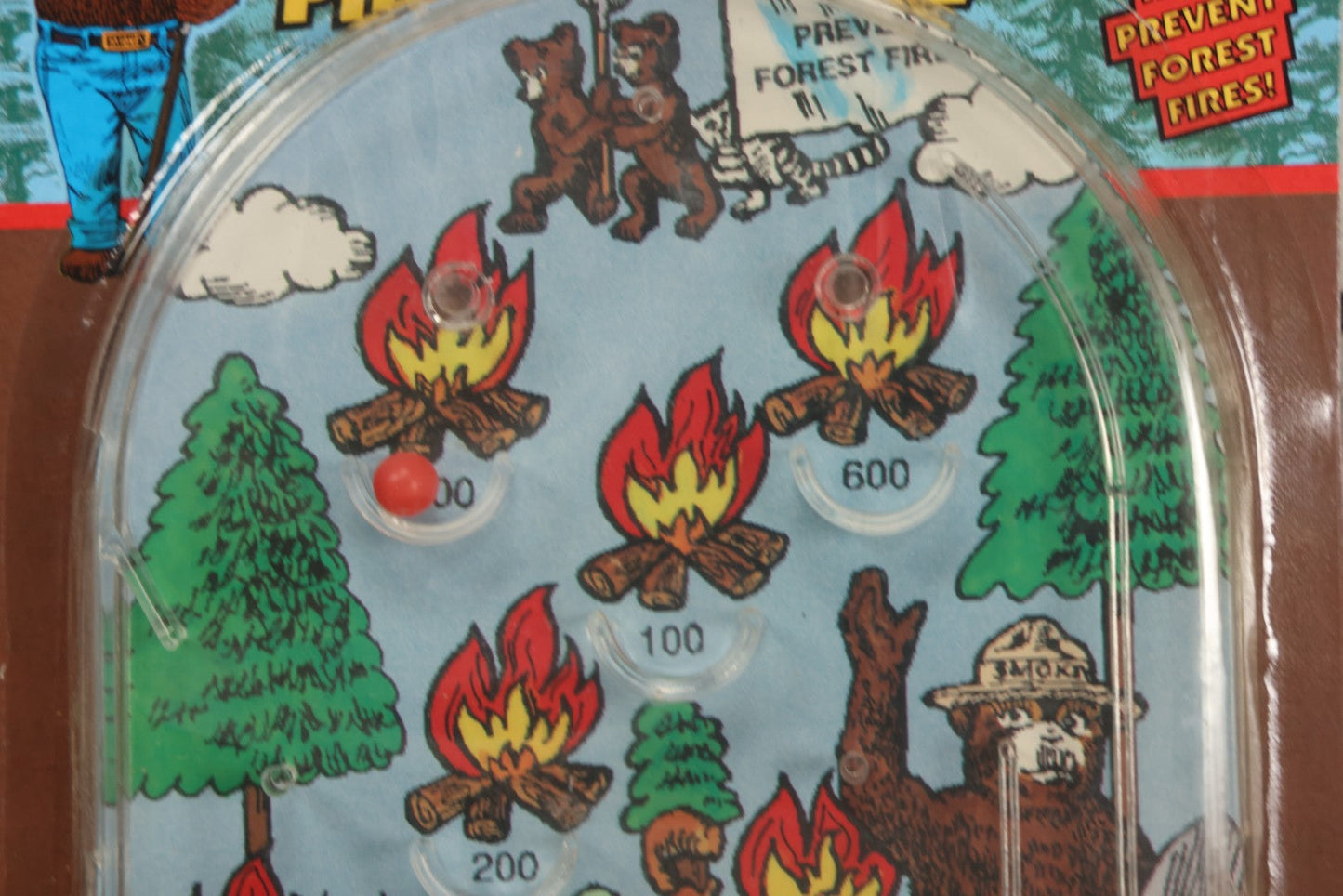 Lot 089 - Grouping Of Eight New Old Stock N.O.S. Smokey Bear "Put Out The Fires..." Pinball Game, Manufactured By Gordy International, Inc., Plainfield, New Jersey, No. 476, Made In China