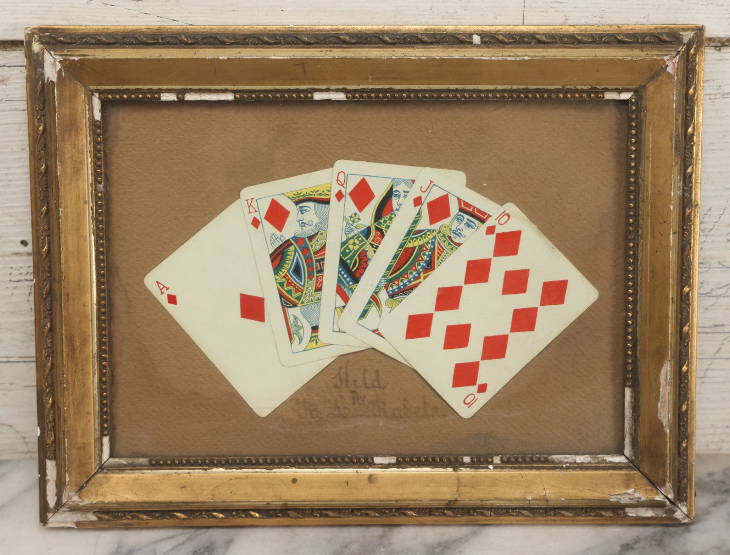 Lot 002 - Antique Royal Straight Flush Poker Card Hand In Frame, Commemorating A Hand Held By R. S. Roberts, Circa Early 20th Century, Original Frame, Note Water Damage And Wear, 12-1/4" x 9-1/4"