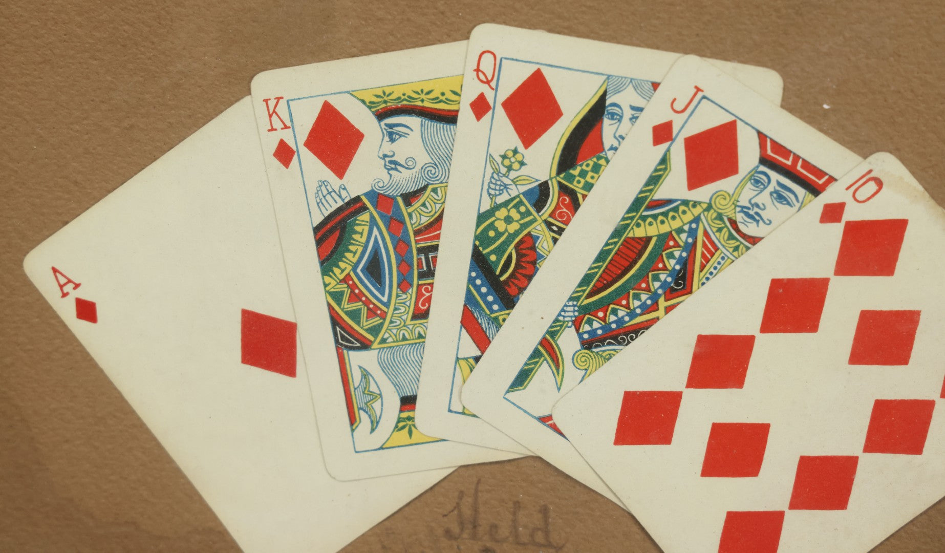 Lot 002 - Antique Royal Straight Flush Poker Card Hand In Frame, Commemorating A Hand Held By R. S. Roberts, Circa Early 20th Century, Original Frame, Note Water Damage And Wear, 12-1/4" x 9-1/4"