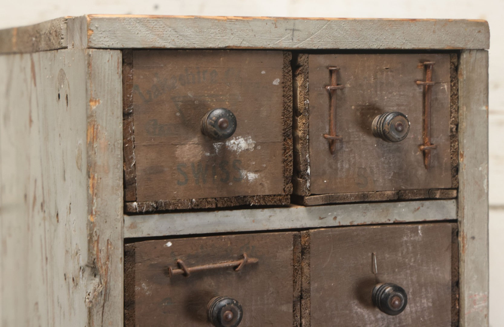 Lot 003 - Antique Make-Do 12-Drawer Nail And Hardware Bin With Drawers Made Out Of Old Cheese Boxes With Wooden Knobs, Many Drawers Divided, With Identifying Sample Nails Stapled To Front, Empty