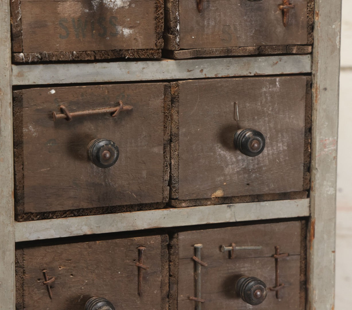 Lot 003 - Antique Make-Do 12-Drawer Nail And Hardware Bin With Drawers Made Out Of Old Cheese Boxes With Wooden Knobs, Many Drawers Divided, With Identifying Sample Nails Stapled To Front, Empty