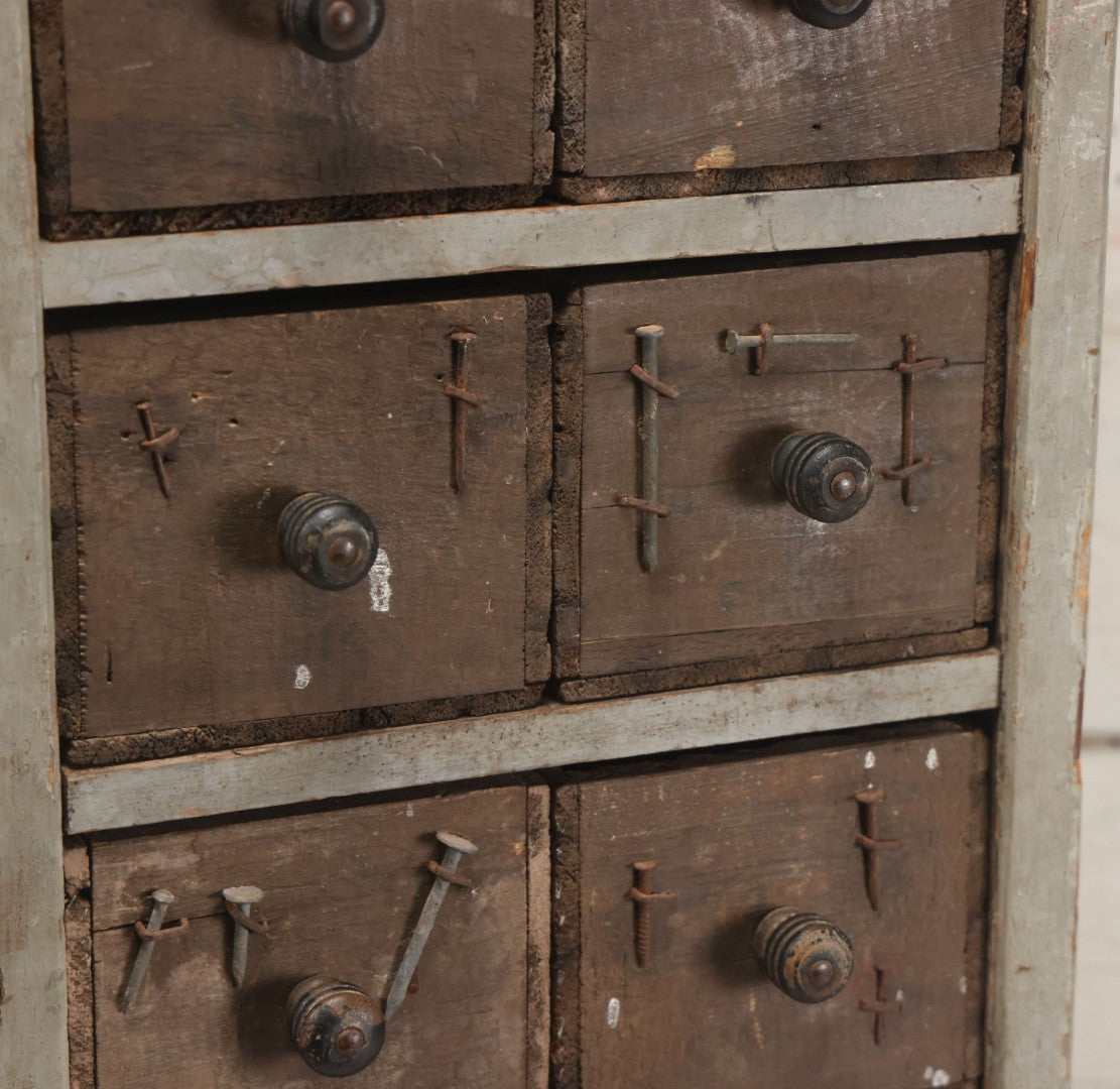 Lot 003 - Antique Make-Do 12-Drawer Nail And Hardware Bin With Drawers Made Out Of Old Cheese Boxes With Wooden Knobs, Many Drawers Divided, With Identifying Sample Nails Stapled To Front, Empty