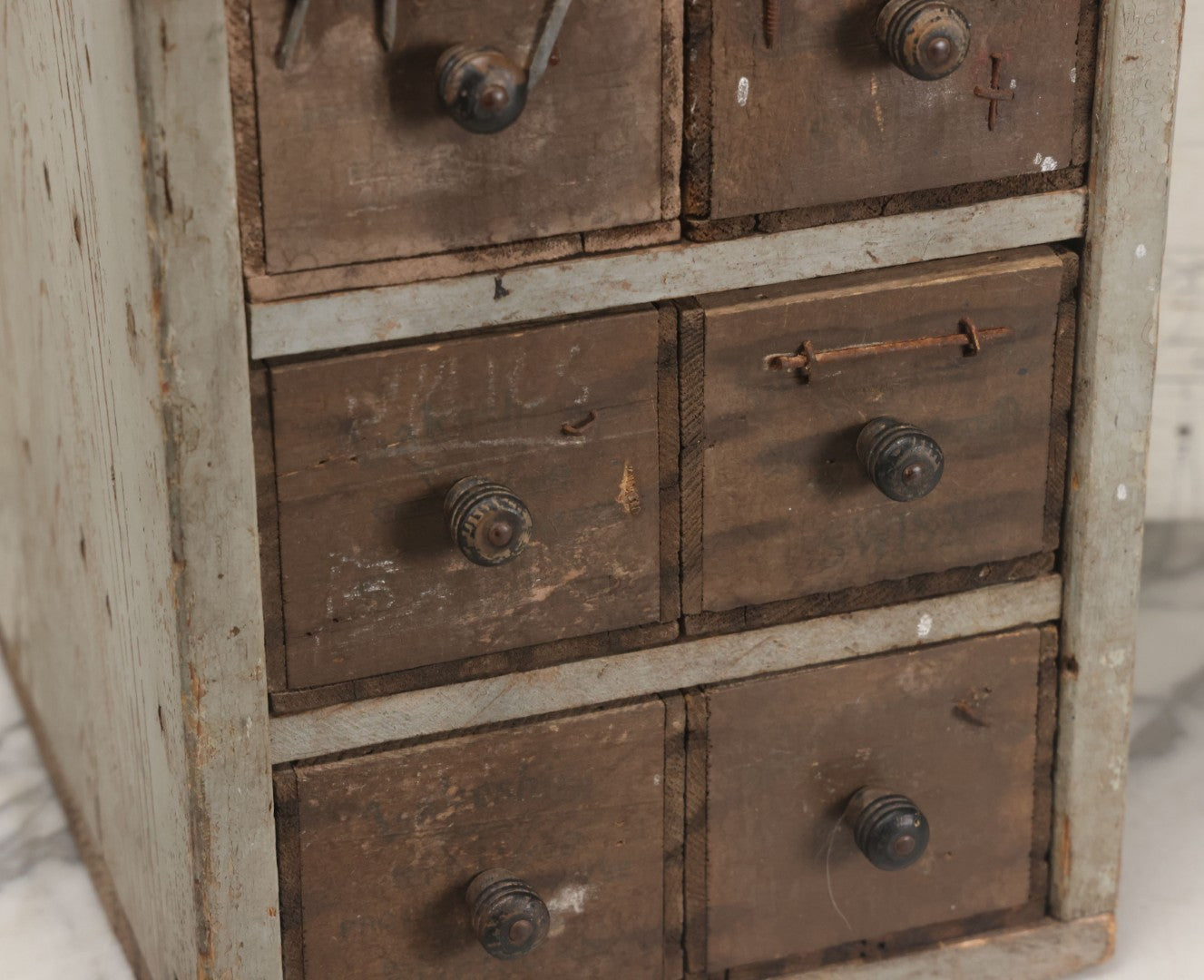 Lot 003 - Antique Make-Do 12-Drawer Nail And Hardware Bin With Drawers Made Out Of Old Cheese Boxes With Wooden Knobs, Many Drawers Divided, With Identifying Sample Nails Stapled To Front, Empty