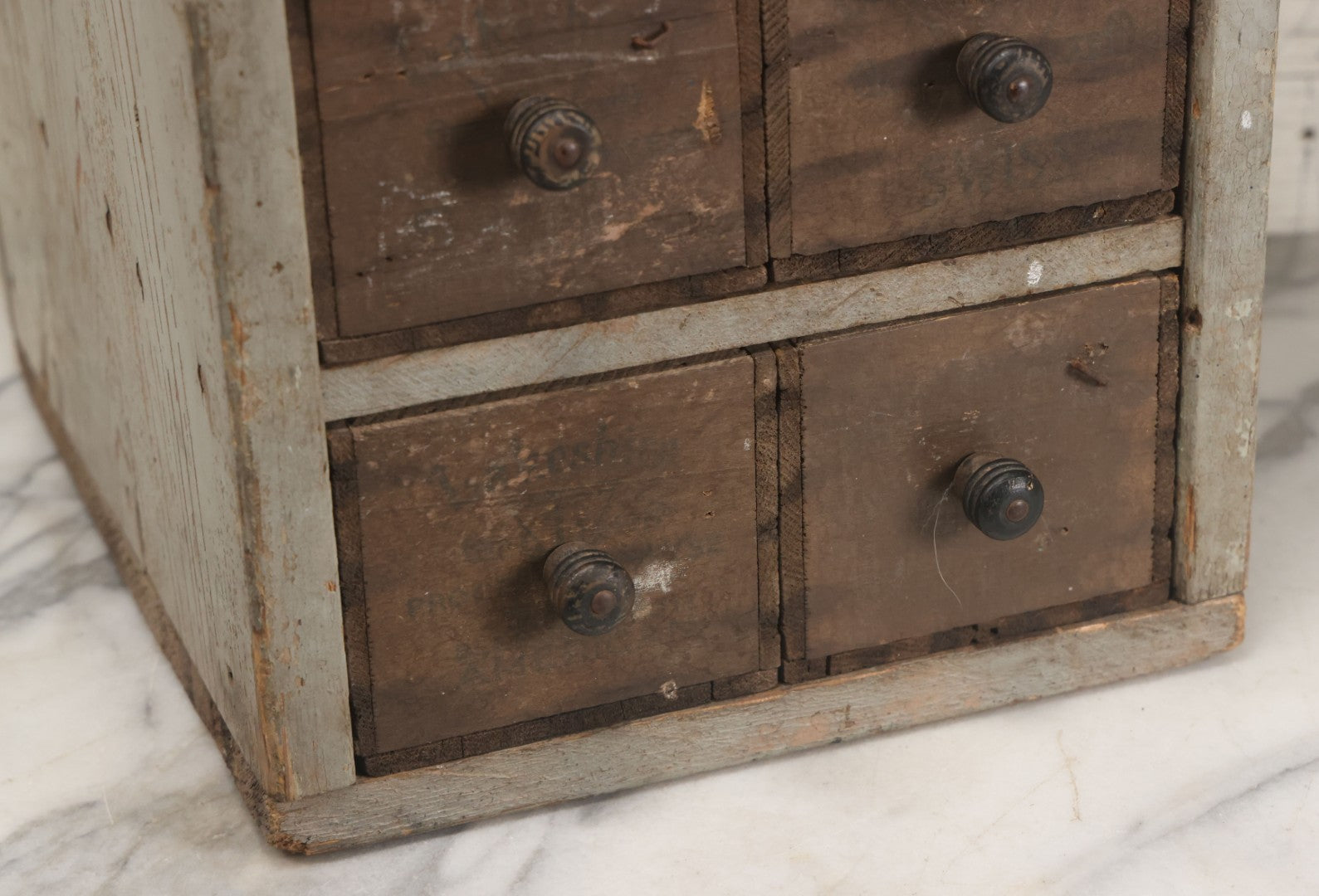 Lot 003 - Antique Make-Do 12-Drawer Nail And Hardware Bin With Drawers Made Out Of Old Cheese Boxes With Wooden Knobs, Many Drawers Divided, With Identifying Sample Nails Stapled To Front, Empty