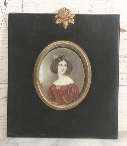 Lot 118 - Antique Hand Colored Cameo Print Of Woman In Red Blouse And Brown Hair In Ebony Wood Frame With Brass Acorn Hanger And Adornments