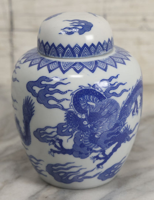 Lot 134 - Vintage Blue And White Porcelain Chinese Dragon Decorated Ginger Jar With Lid