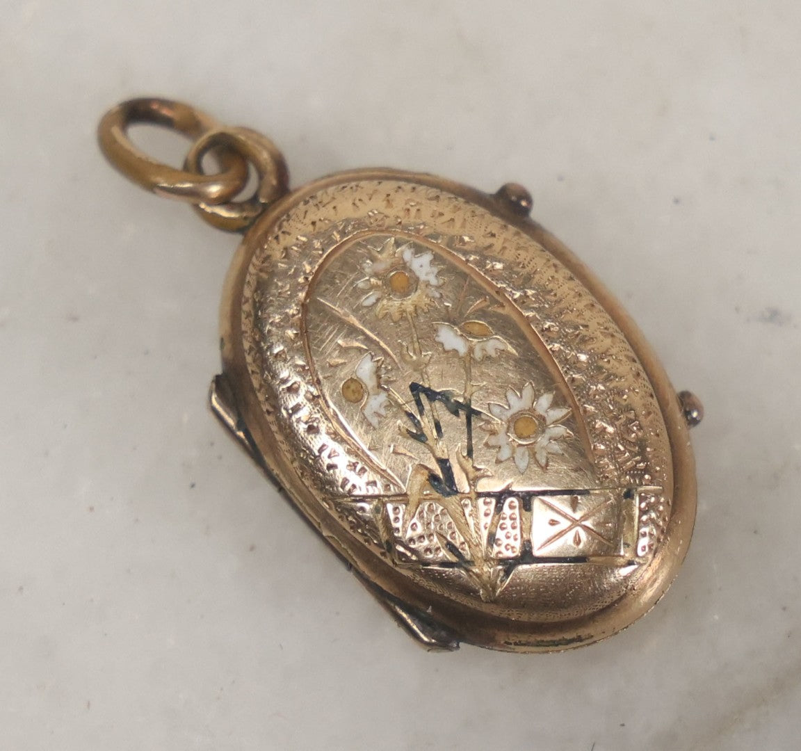 Lot 007 - Antique Victorian Gold Toned Locket With Engraved And Painted Daisies And Blond And Brown Hair Mementos Inside Behind Beveled Glass Windows