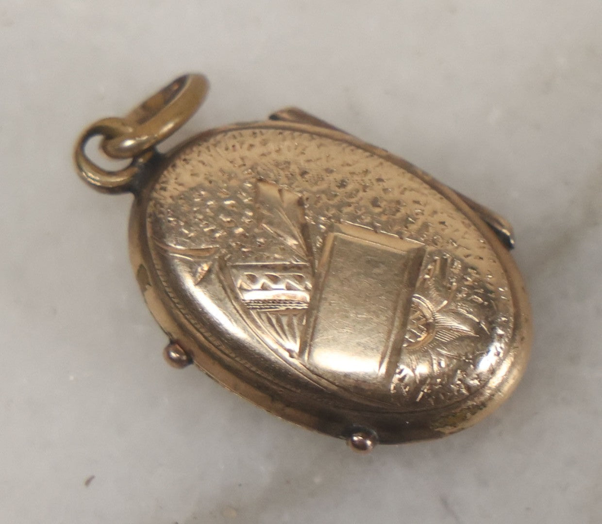 Lot 007 - Antique Victorian Gold Toned Locket With Engraved And Painted Daisies And Blond And Brown Hair Mementos Inside Behind Beveled Glass Windows
