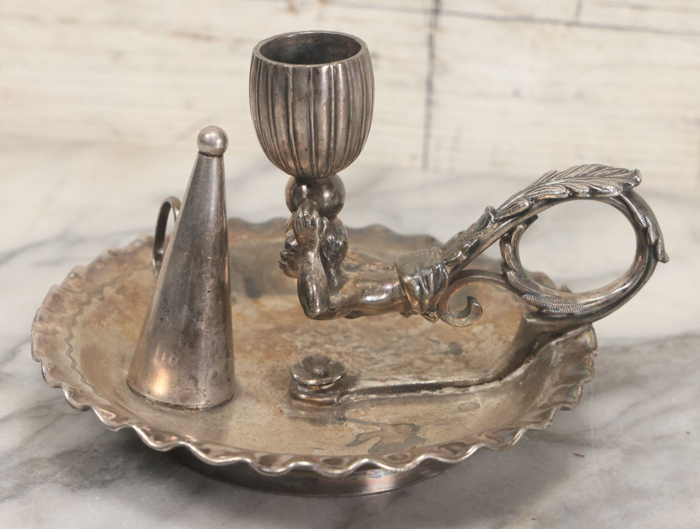Lot 008 - Antique Silverplate Figural Candle Stand With Genie Motif, Manufactured By Wilcox Silverplate, No. 2731, Meriden, Connecticut, With Original Candle Snuffer