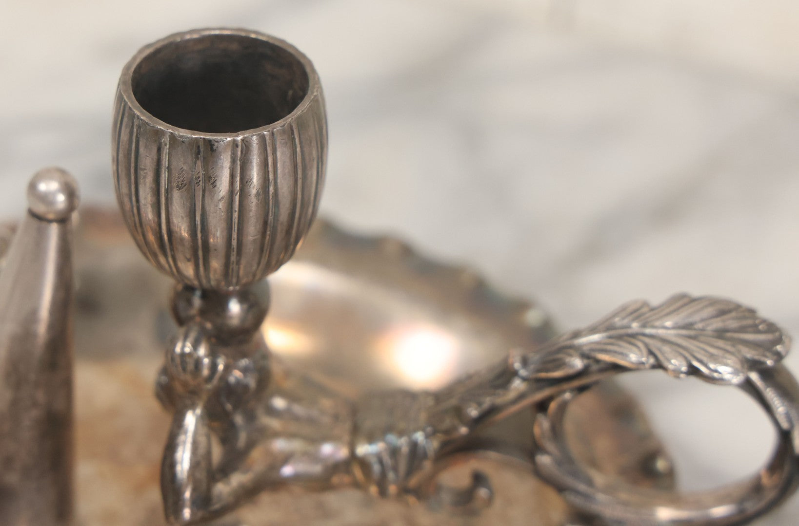 Lot 008 - Antique Silverplate Figural Candle Stand With Genie Motif, Manufactured By Wilcox Silverplate, No. 2731, Meriden, Connecticut, With Original Candle Snuffer