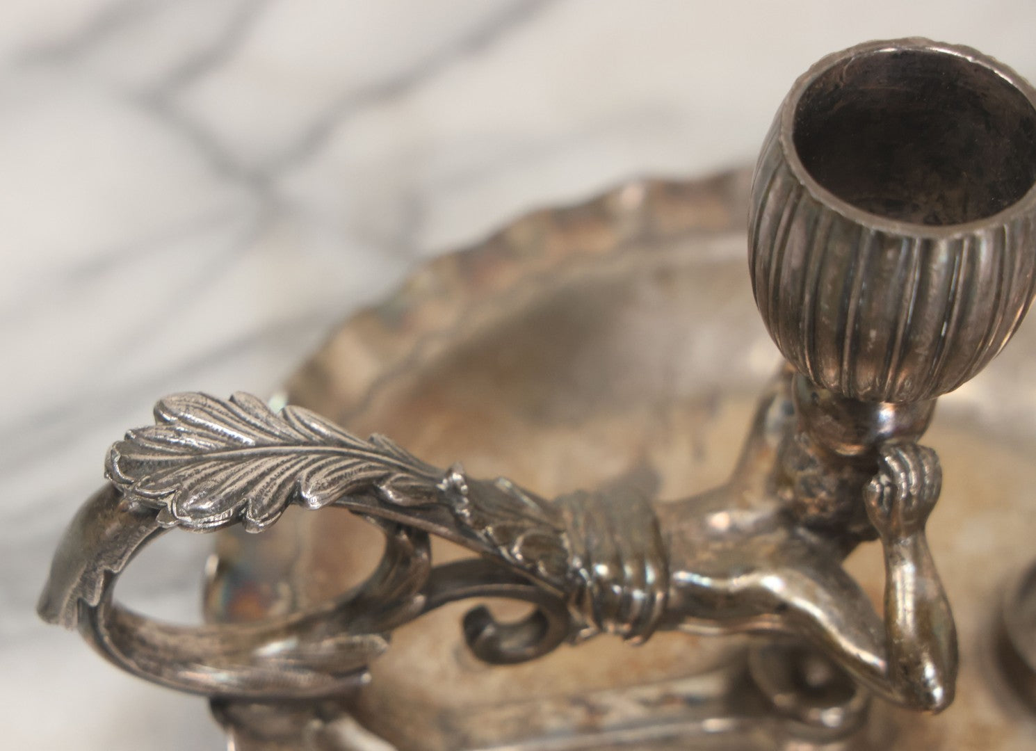 Lot 008 - Antique Silverplate Figural Candle Stand With Genie Motif, Manufactured By Wilcox Silverplate, No. 2731, Meriden, Connecticut, With Original Candle Snuffer