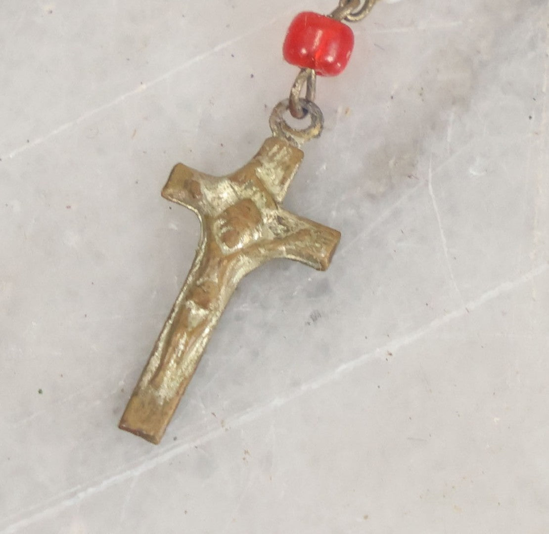 Lot 016 - Vintage Miniature White And Red Glass Rosary Beads With Crucifix In Button Sized Metal Carrying Case With Embossed Saint Therese