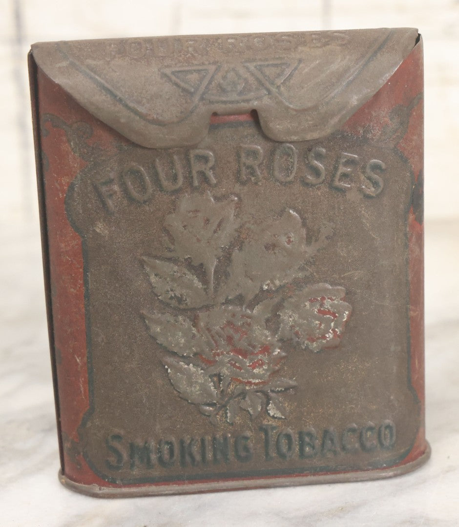 Lot 017 - Vintage Pressed Tin Four Roses Smoking Tobacco Pocket Box With Remnants Of Original Paint