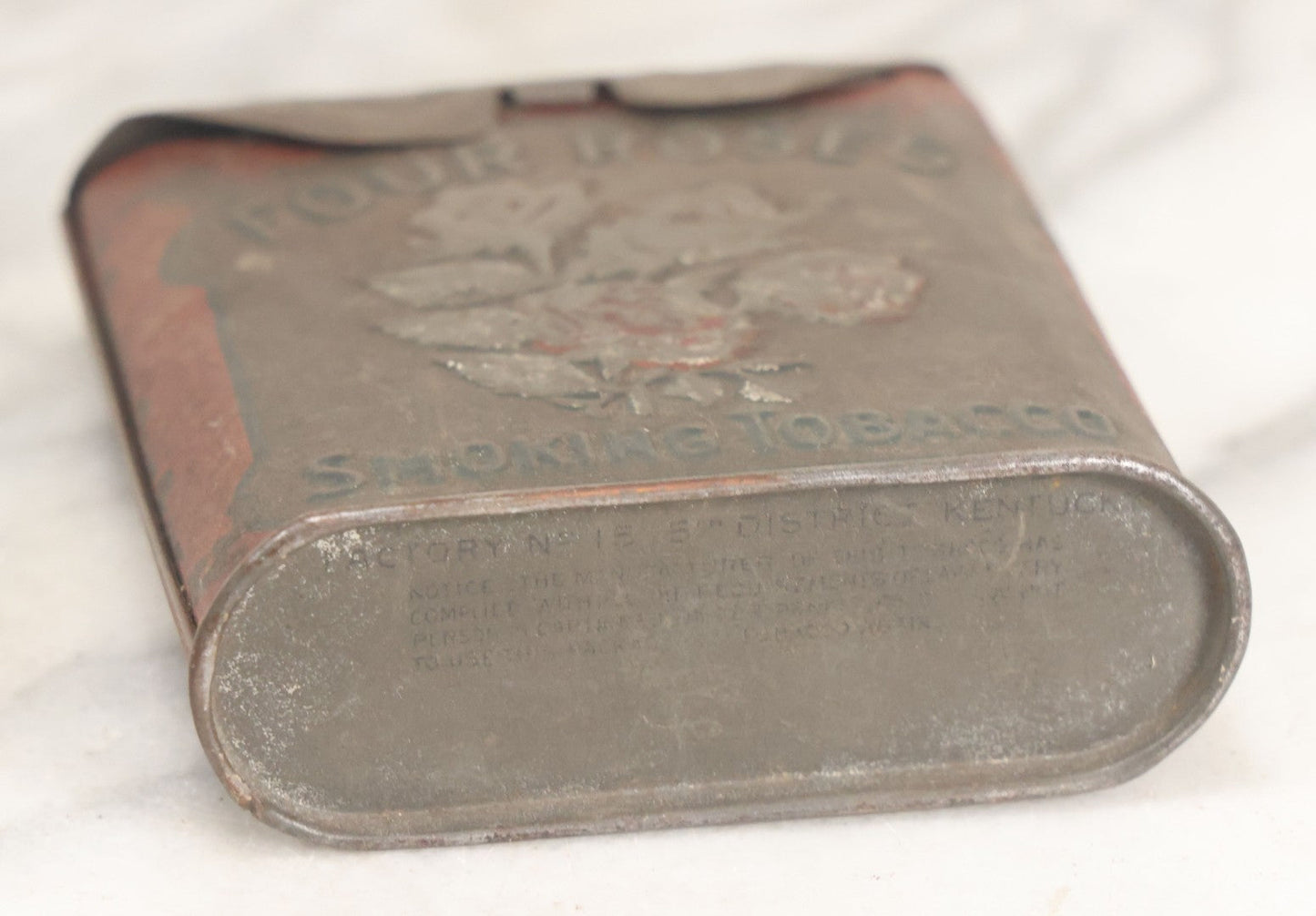 Lot 017 - Vintage Pressed Tin Four Roses Smoking Tobacco Pocket Box With Remnants Of Original Paint