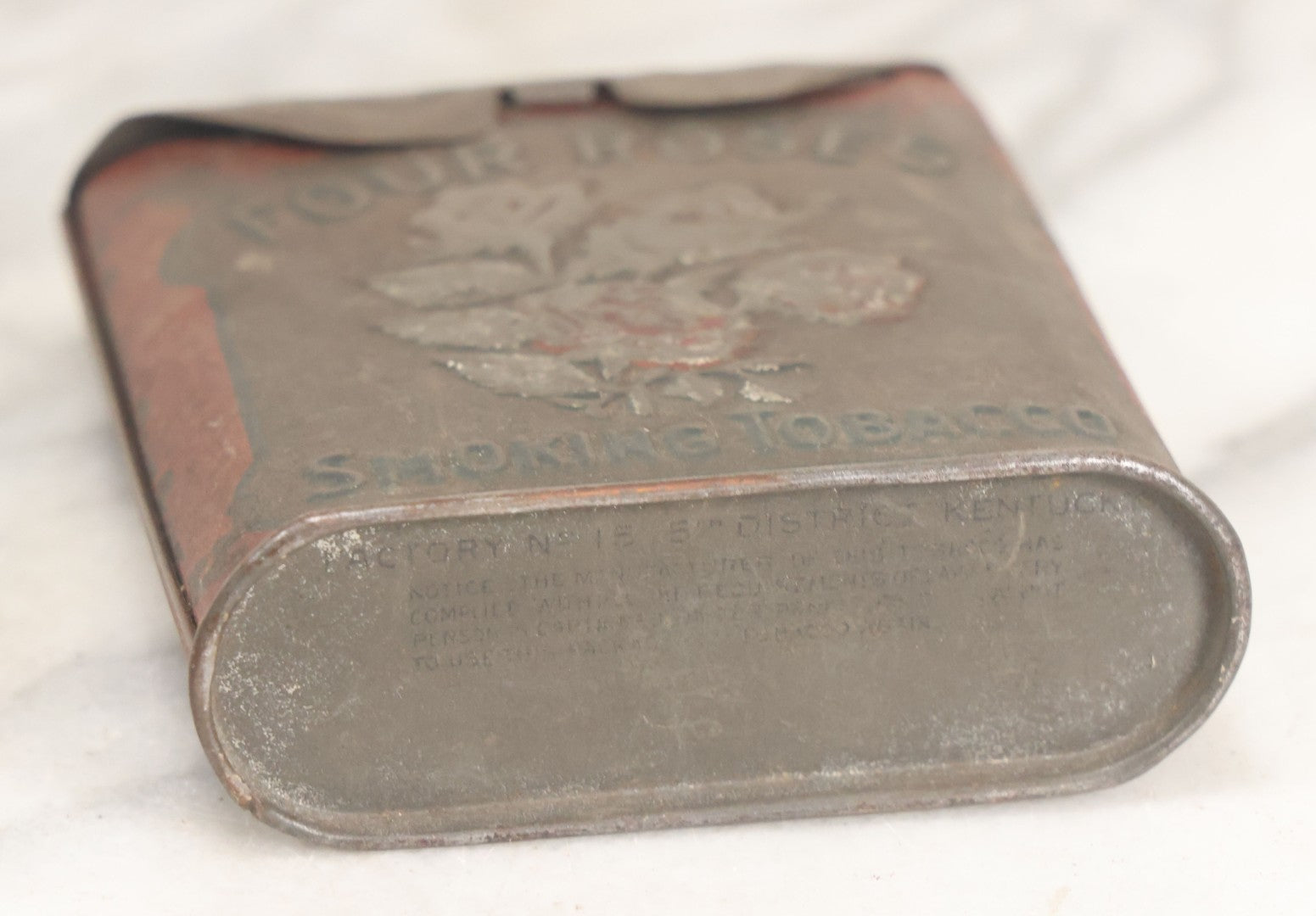 Lot 017 - Vintage Pressed Tin Four Roses Smoking Tobacco Pocket Box With Remnants Of Original Paint