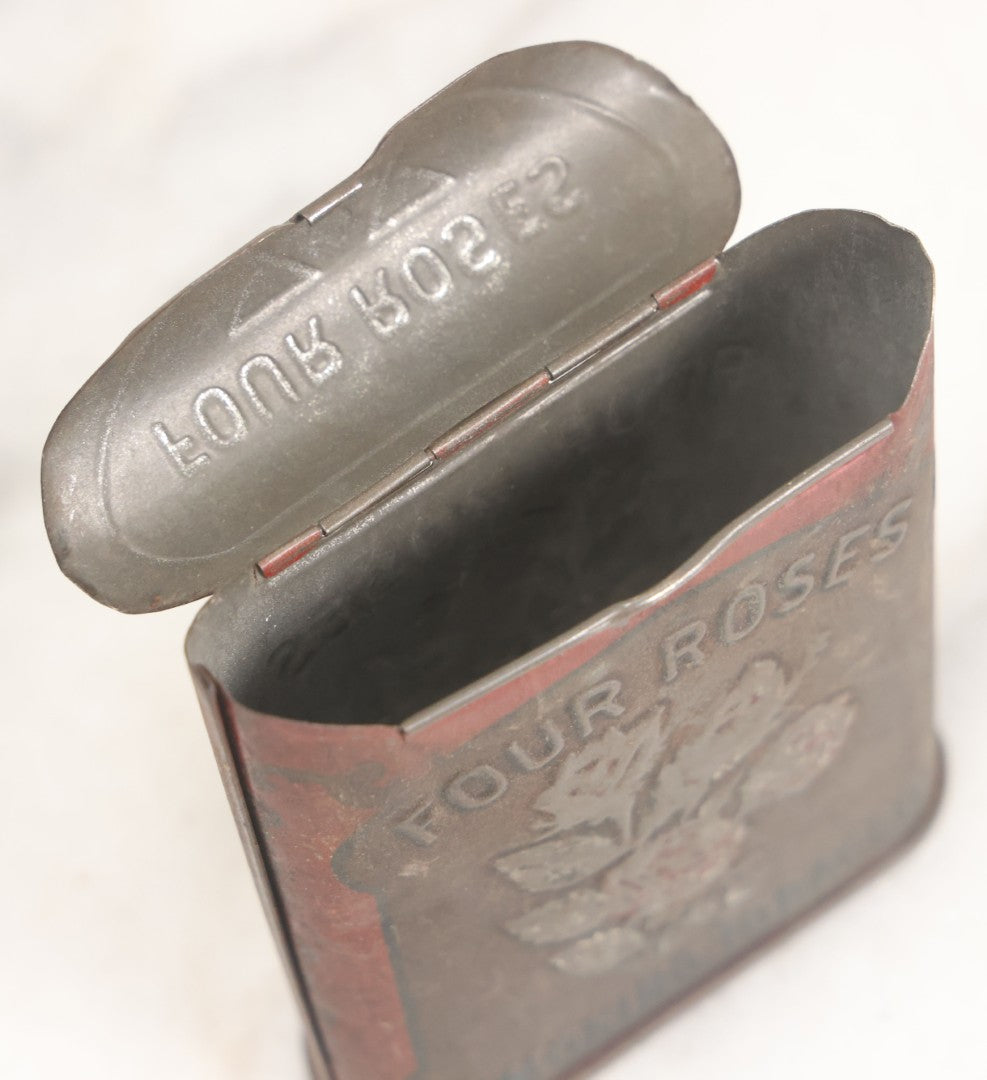 Lot 017 - Vintage Pressed Tin Four Roses Smoking Tobacco Pocket Box With Remnants Of Original Paint