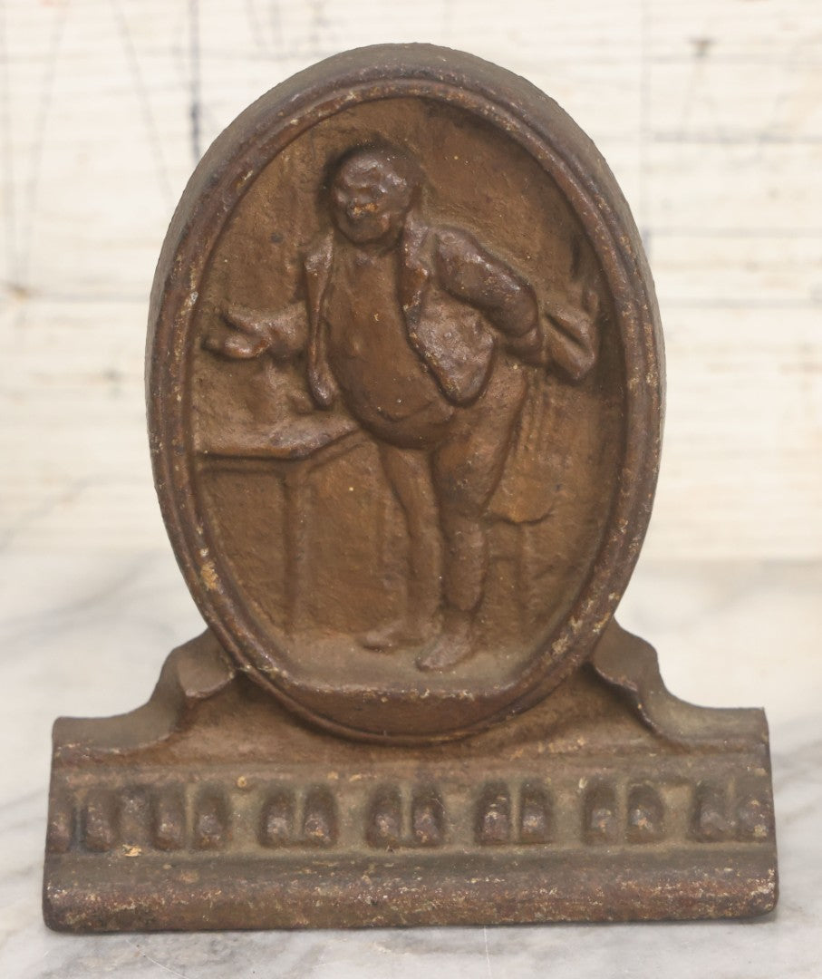 Lot 020 - Antique Cast Iron Bookends Featuring Portly Business Man In Suit With Handout