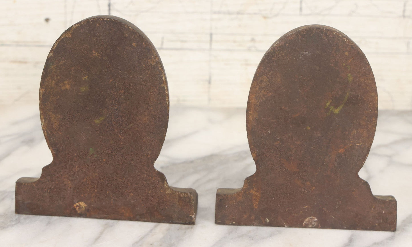 Lot 020 - Antique Cast Iron Bookends Featuring Portly Business Man In Suit With Handout