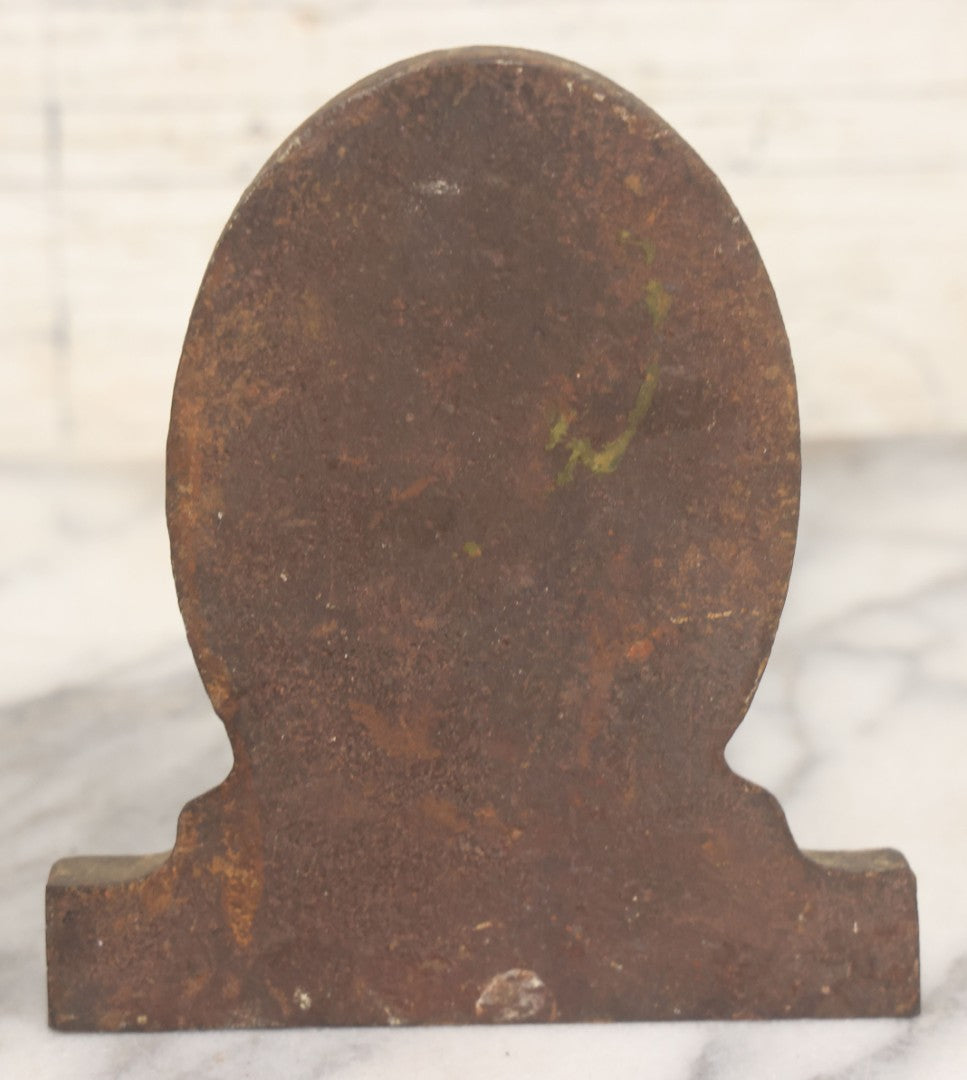 Lot 020 - Antique Cast Iron Bookends Featuring Portly Business Man In Suit With Handout