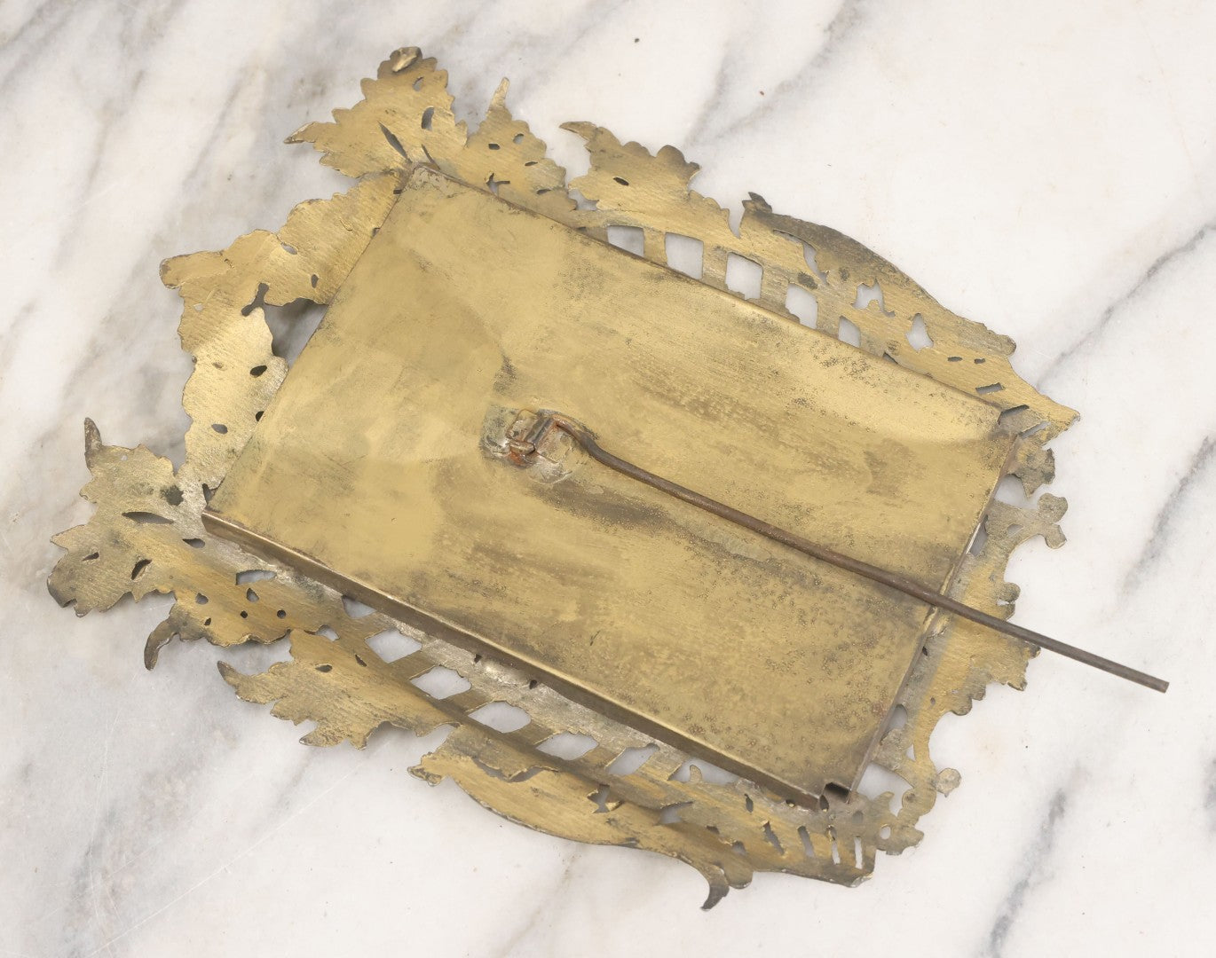 Lot 023 - Antique Ornate Brass Toned Metal Cabinet Card Sized Photo Frame With Leaf Motif, Kickstand, Note Small Losses, Soft Metal