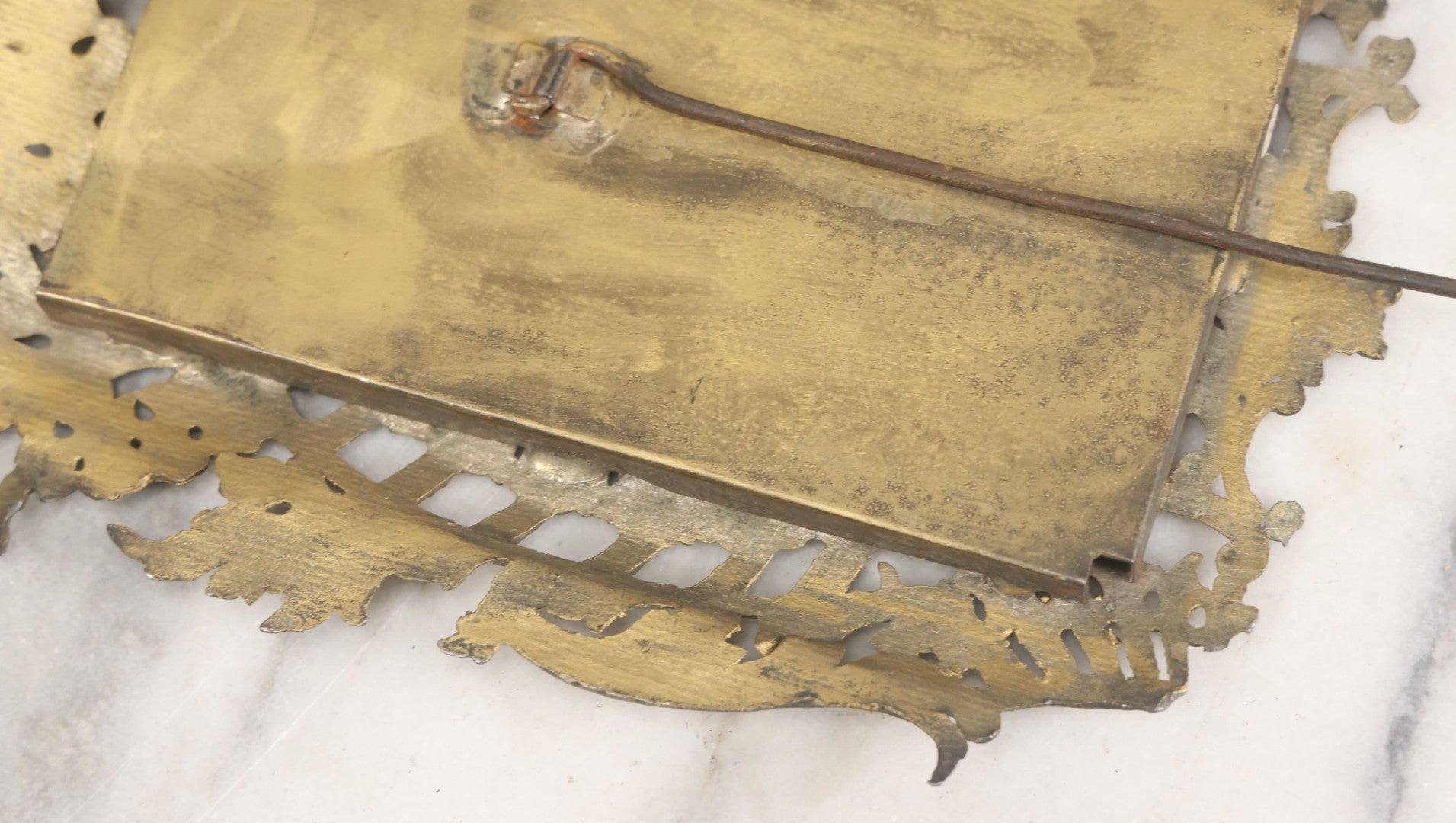 Lot 023 - Antique Ornate Brass Toned Metal Cabinet Card Sized Photo Frame With Leaf Motif, Kickstand, Note Small Losses, Soft Metal