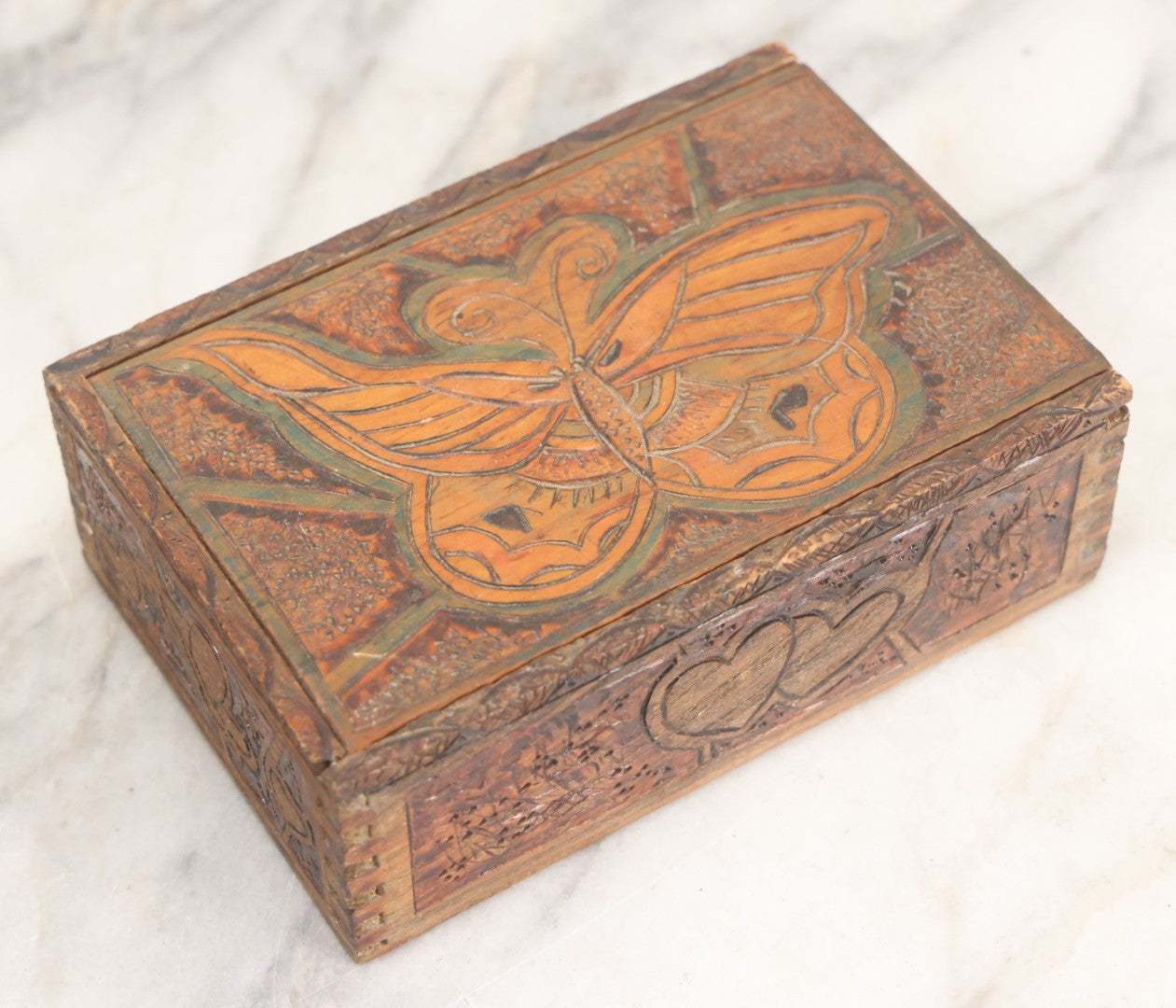 Lot 026 - Antique Art Nouveau Flemish Art Pyrography Wood Burned Trinket Box With Butterfly Decorated Lid And Hearts Around Side With Green And Red Coloring