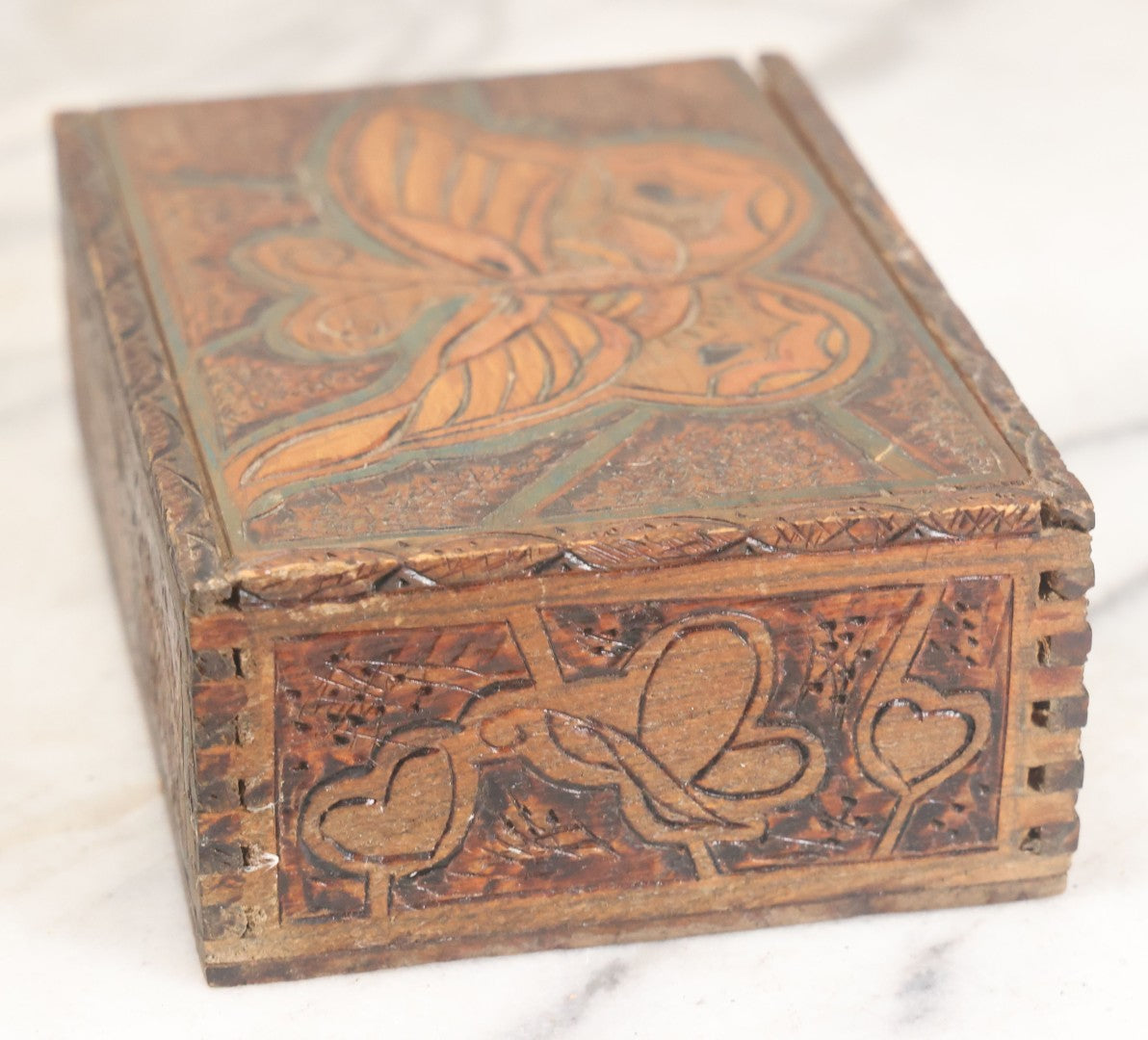 Lot 026 - Antique Art Nouveau Flemish Art Pyrography Wood Burned Trinket Box With Butterfly Decorated Lid And Hearts Around Side With Green And Red Coloring