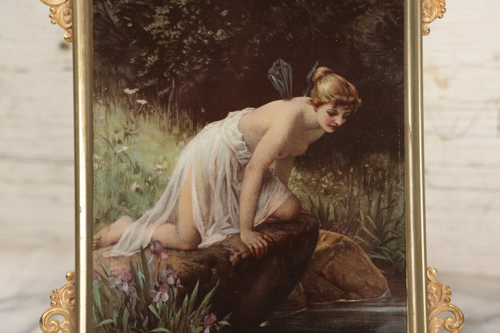 Lot 029 - Antique Glass Mounted Print Of Nude Fairy, After Paul Thumann's "Psyche" With Metal Frame Adornments And Kickstand, 8-1/2" x 10-1/2"