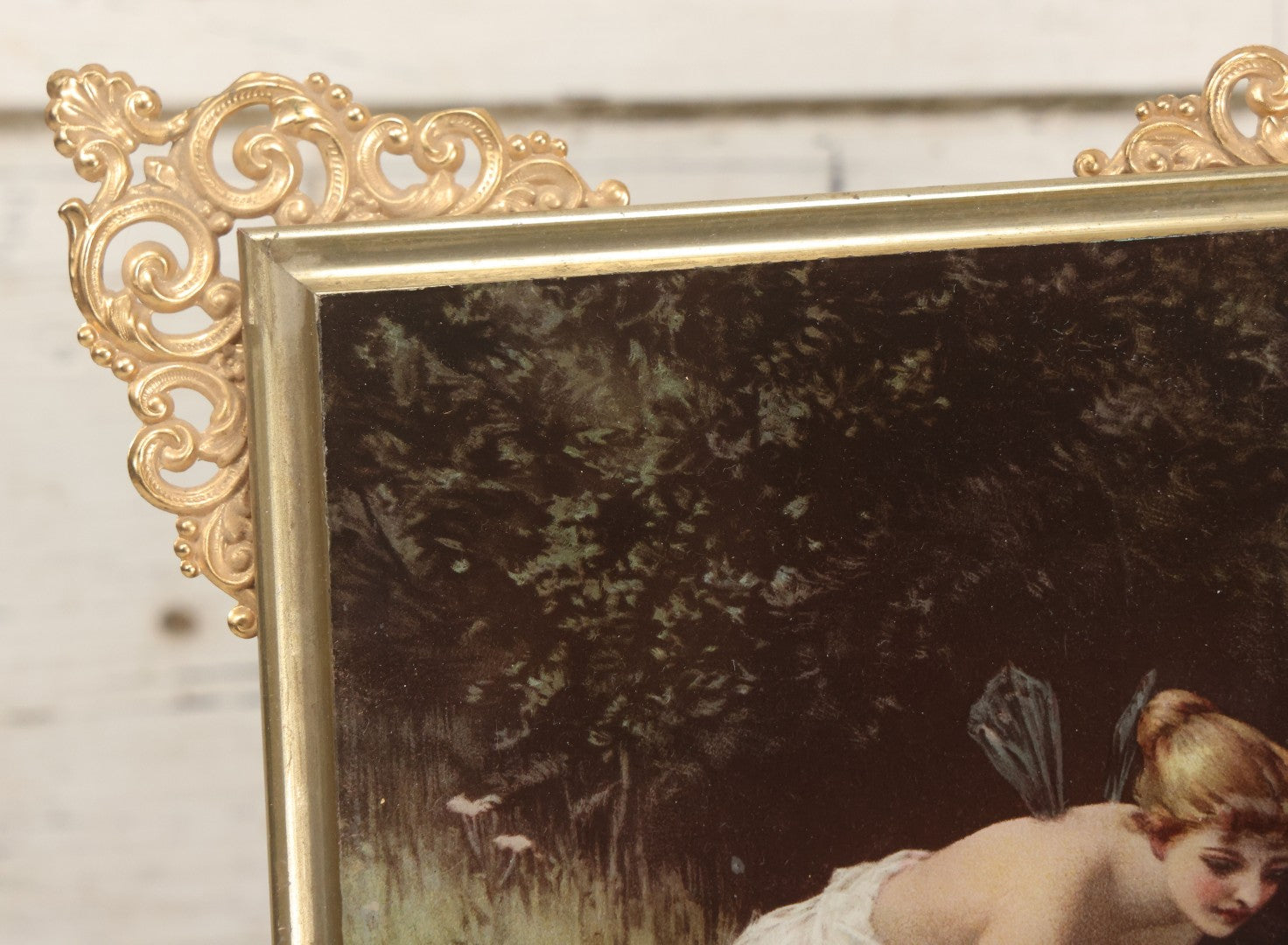 Lot 029 - Antique Glass Mounted Print Of Nude Fairy, After Paul Thumann's "Psyche" With Metal Frame Adornments And Kickstand, 8-1/2" x 10-1/2"