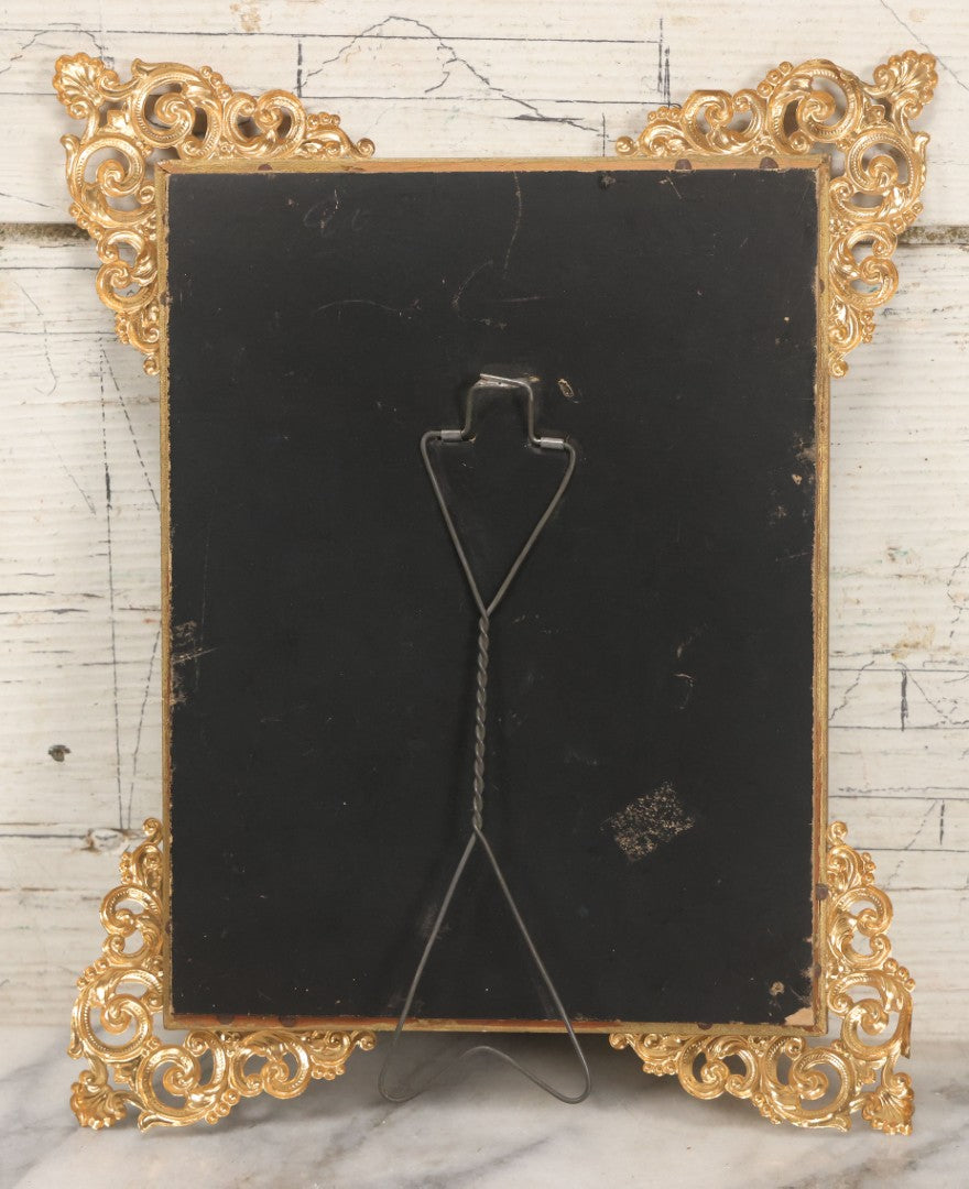 Lot 029 - Antique Glass Mounted Print Of Nude Fairy, After Paul Thumann's "Psyche" With Metal Frame Adornments And Kickstand, 8-1/2" x 10-1/2"