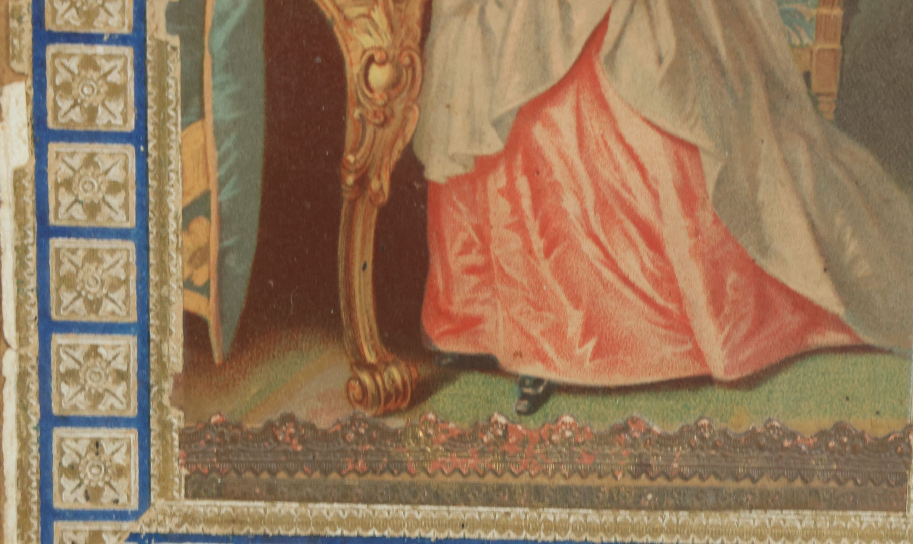 Lot 032 - Antique Lithographed Paper Board Box Cover Depicting Young Woman In Pink Dress Playing With Her Goldfish In Period Etched Wooden Frame, 10-5/8" x 11-3/4"