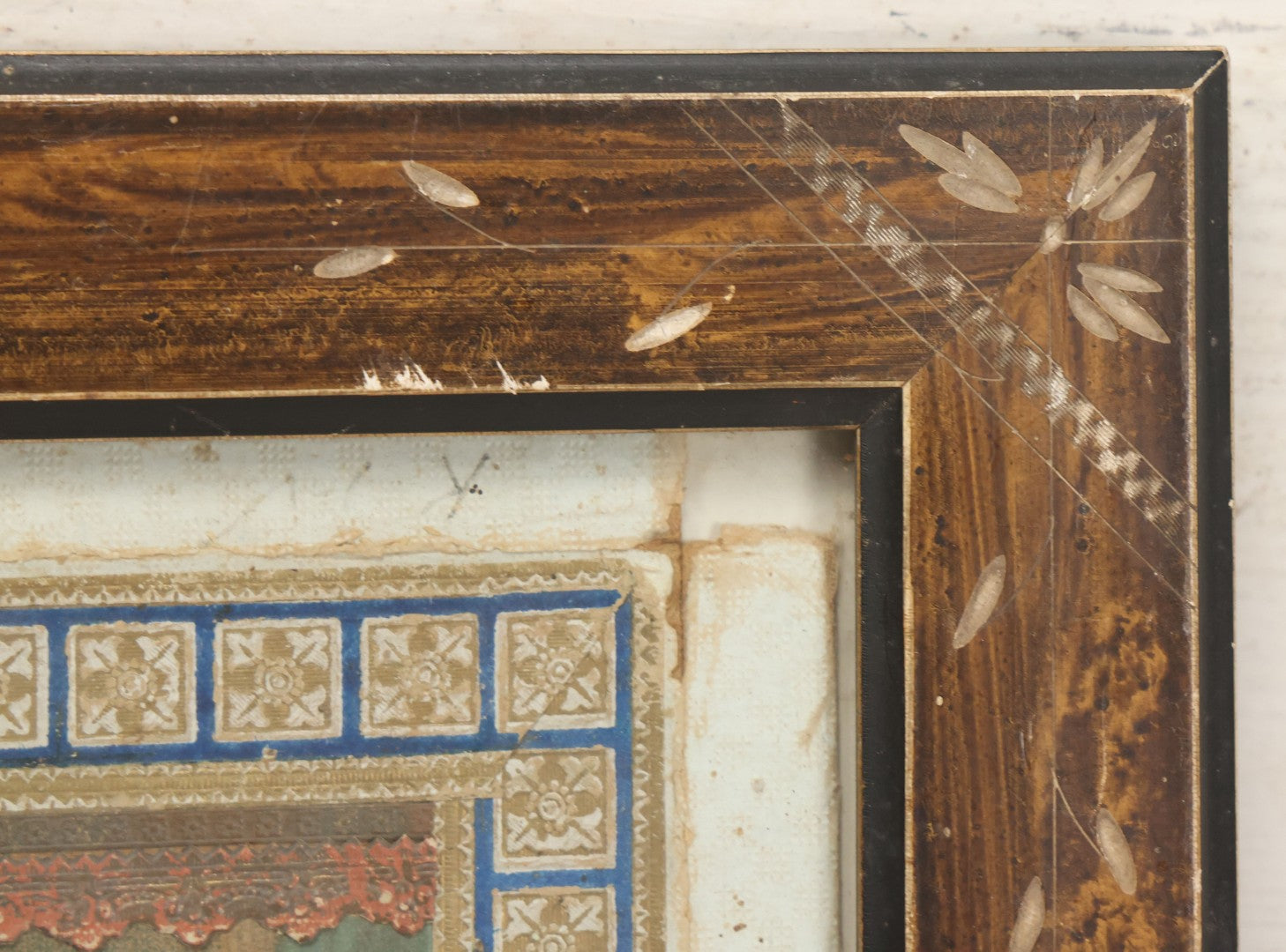 Lot 032 - Antique Lithographed Paper Board Box Cover Depicting Young Woman In Pink Dress Playing With Her Goldfish In Period Etched Wooden Frame, 10-5/8" x 11-3/4"