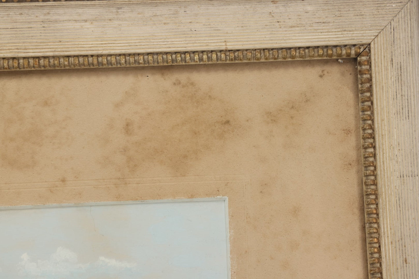 Lot 033 - Antique Painted Over Photograph Of Oceanside Cliffs And Beach With Child Seated On Rocks Likely Gay Head Cliffs, Martha's Vineyard, Massachusetts, In Original Frame, 17-1/2" x 15-1/2"