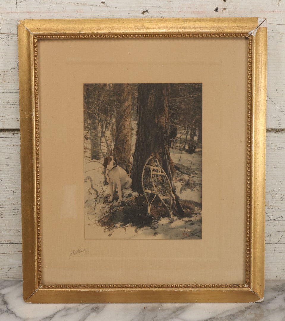 Lot 034 - Antique Hand Tinted Hunting Photograph With Hunting Dog Snowshoes And Rifle, Signed In Pencil Lower Left Homes "The Studio," Chocorua, New Hampshire, In Original Frame, 12-1/2" x 14-1/2"