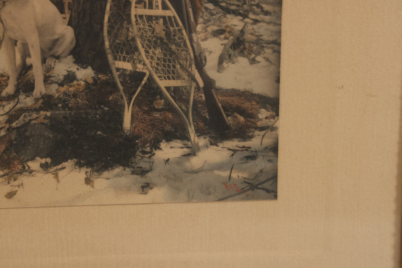 Lot 034 - Antique Hand Tinted Hunting Photograph With Hunting Dog Snowshoes And Rifle, Signed In Pencil Lower Left Homes "The Studio," Chocorua, New Hampshire, In Original Frame, 12-1/2" x 14-1/2"