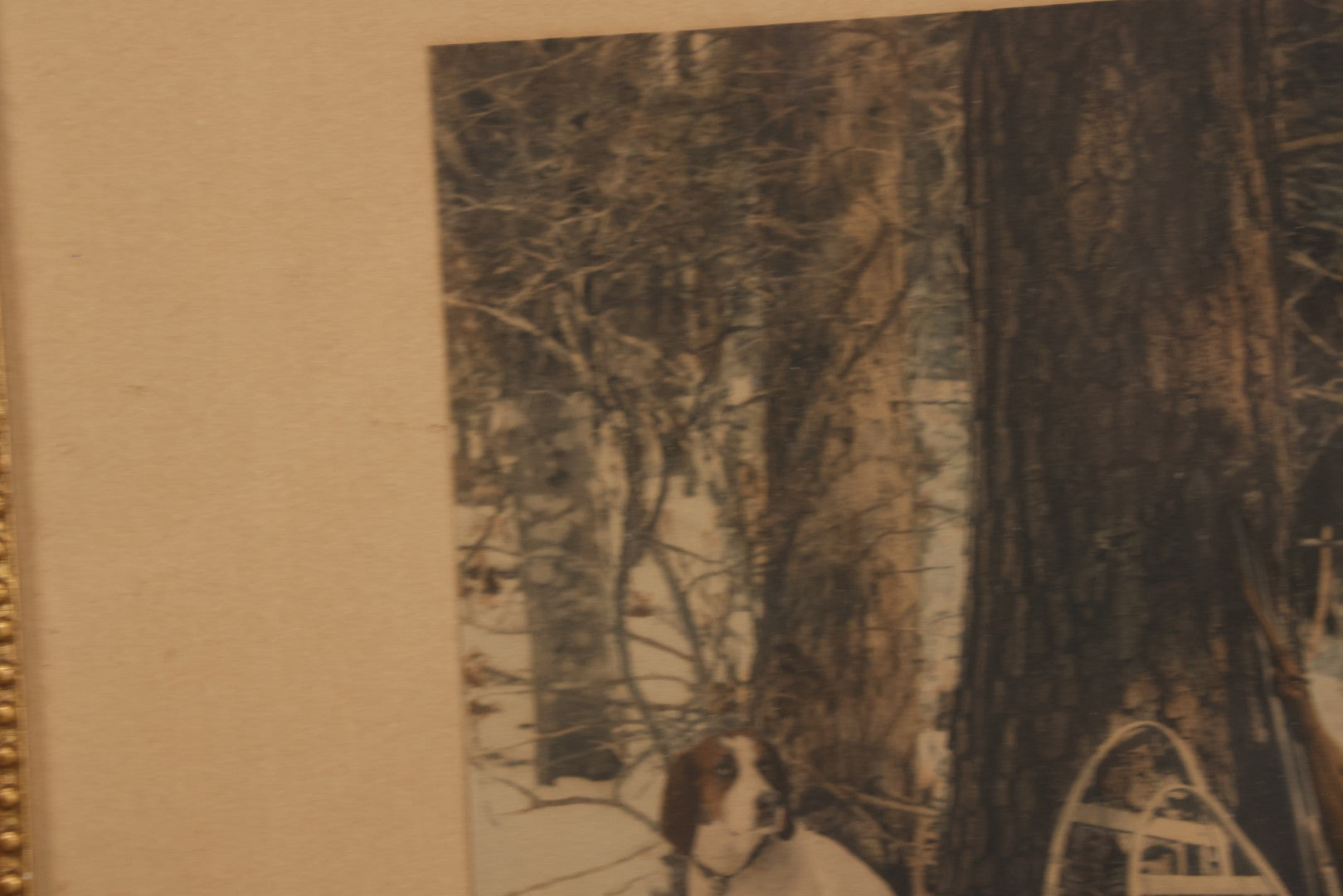 Lot 034 - Antique Hand Tinted Hunting Photograph With Hunting Dog Snowshoes And Rifle, Signed In Pencil Lower Left Homes "The Studio," Chocorua, New Hampshire, In Original Frame, 12-1/2" x 14-1/2"
